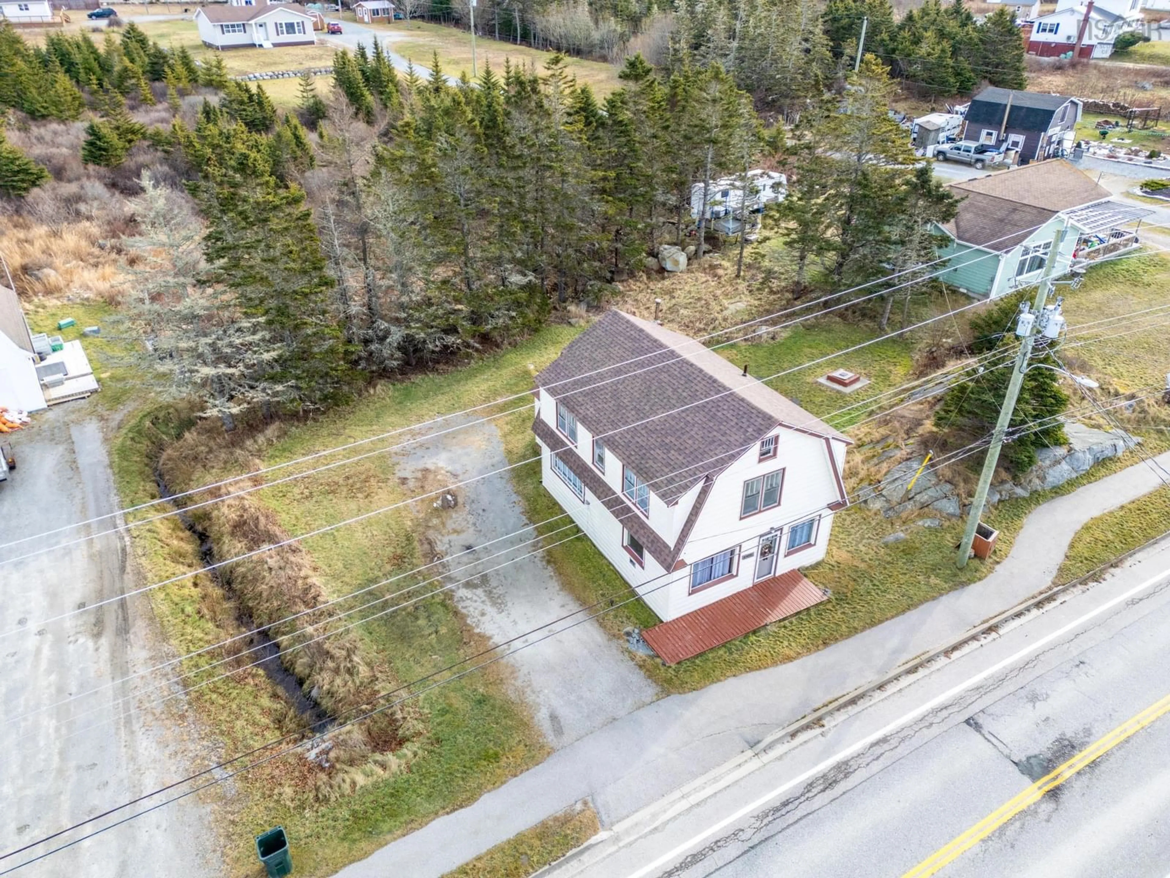 A pic from outside/outdoor area/front of a property/back of a property/a pic from drone, street for 6622 Highway 3, Lower Woods Harbour Nova Scotia B0W 2E0