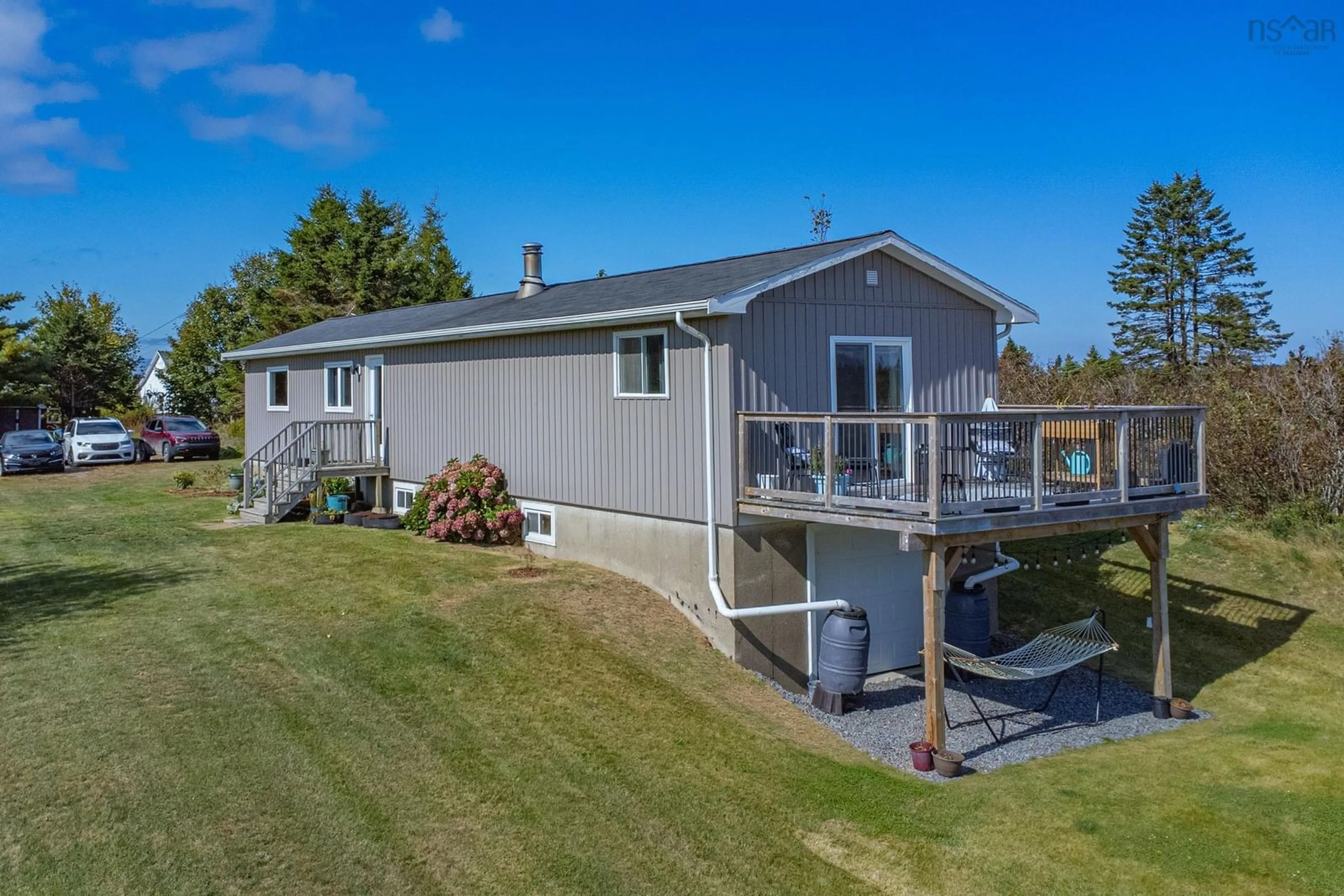 A pic from outside/outdoor area/front of a property/back of a property/a pic from drone, water/lake/river/ocean view for 6656 Highway 1, St. Alphonse Nova Scotia B0W 2J0