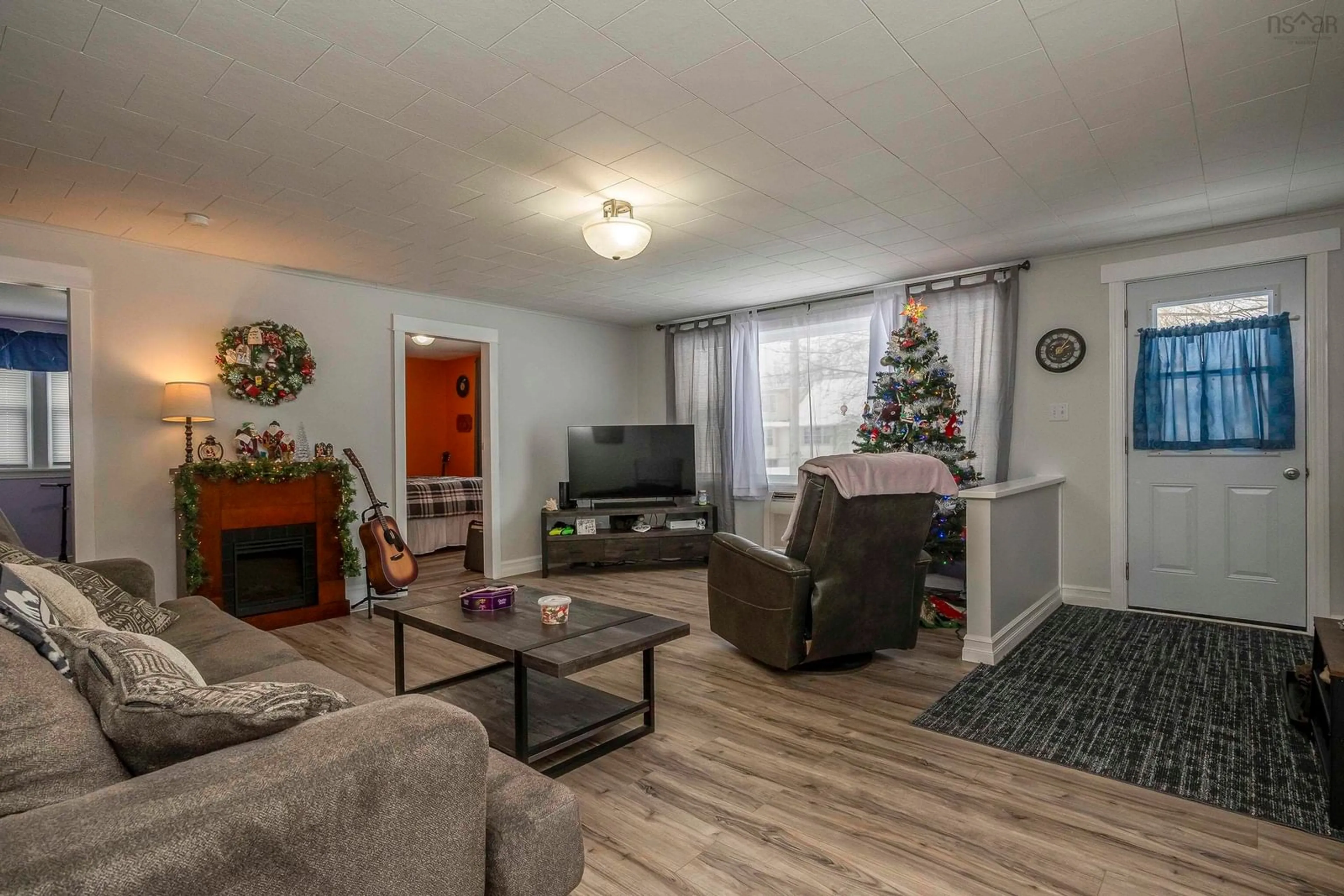 Living room with furniture, wood/laminate floor for 1366 Spring Garden Rd, Kingston Nova Scotia B0P 1R0