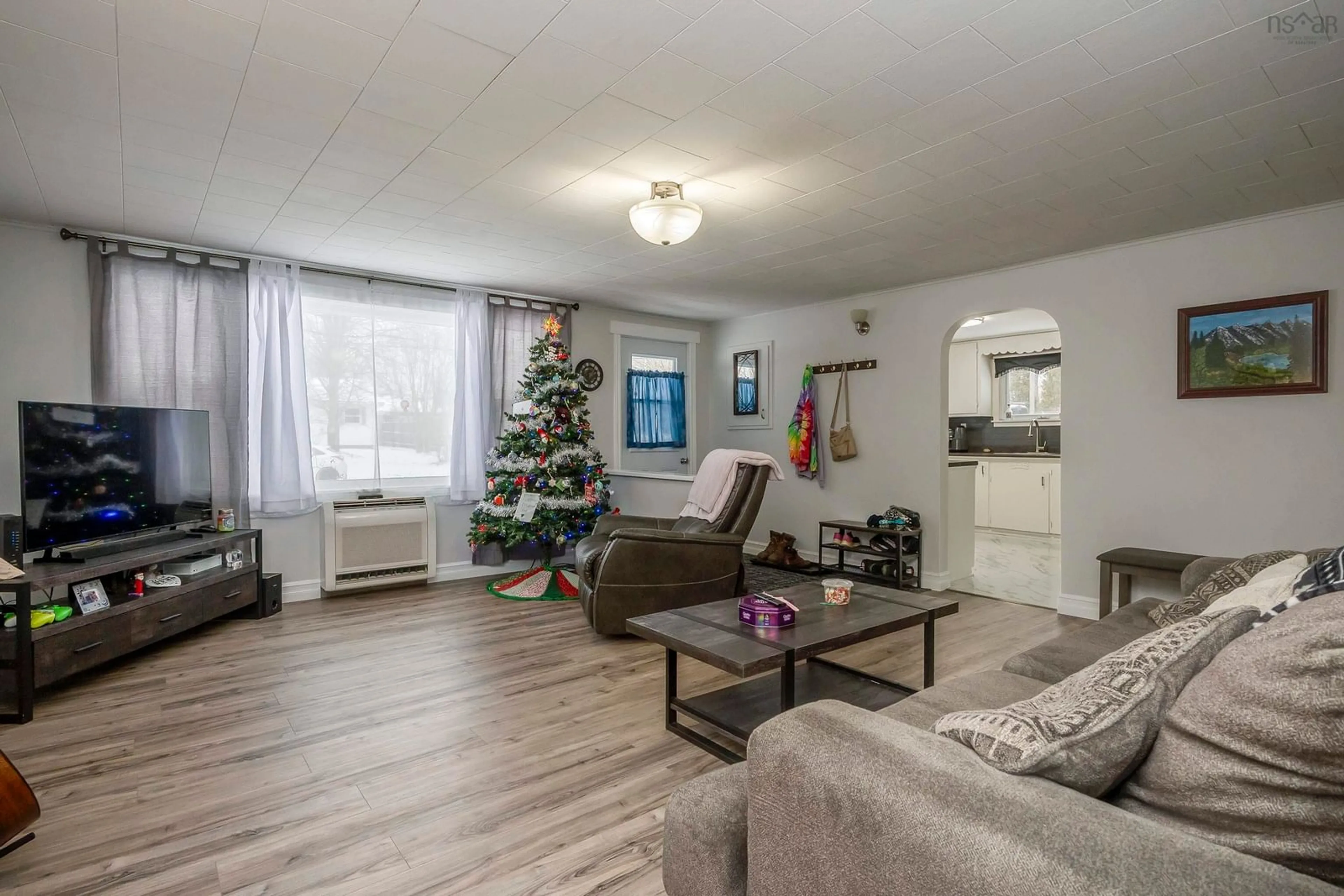 Living room with furniture, wood/laminate floor for 1366 Spring Garden Rd, Kingston Nova Scotia B0P 1R0