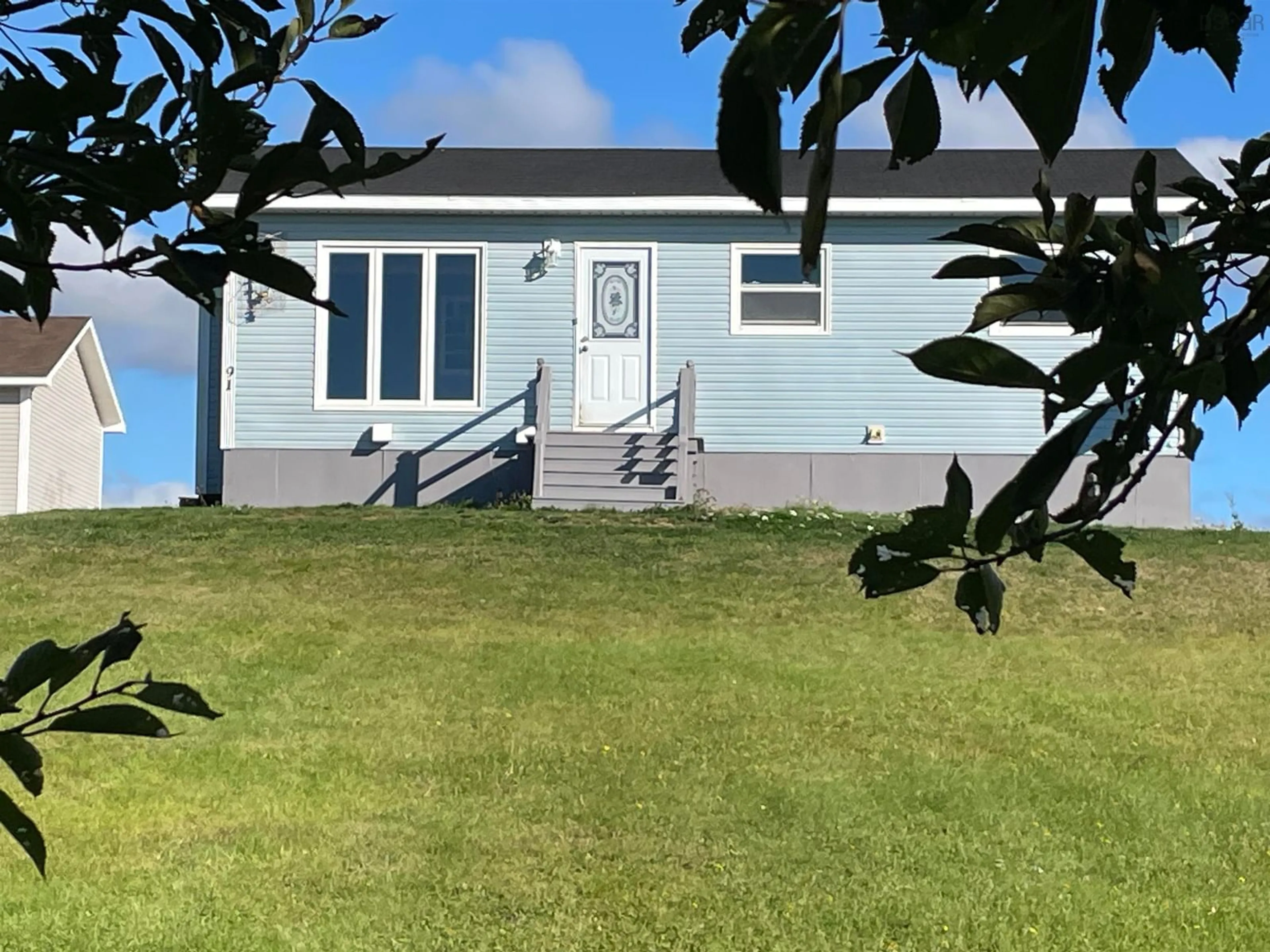 A pic from outside/outdoor area/front of a property/back of a property/a pic from drone, unknown for 91 La Pointe Du Havre Rd, Chéticamp Nova Scotia B0E 1H0