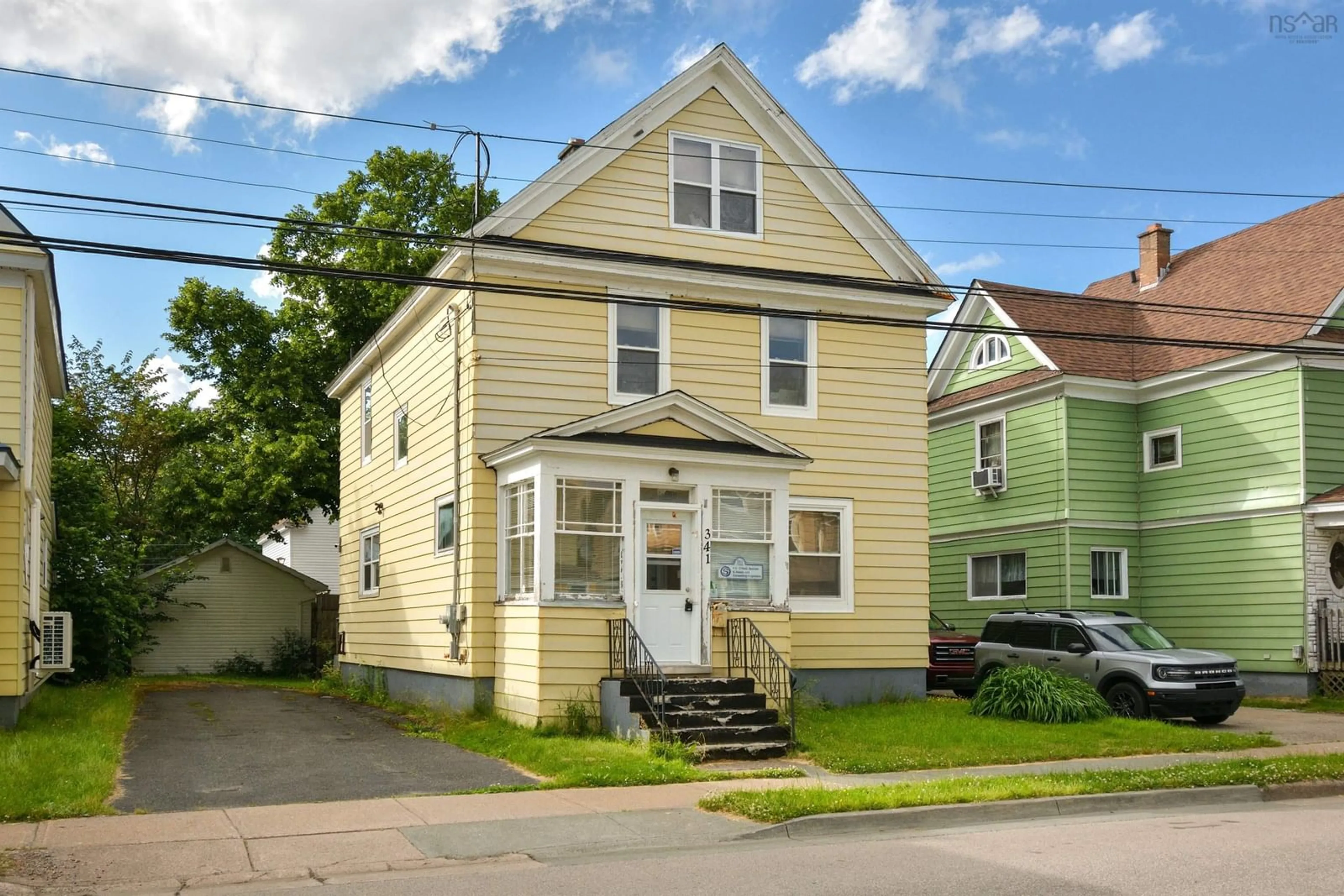 Home with vinyl exterior material, street for 341 Townsend St, Sydney Nova Scotia B1P 5G1