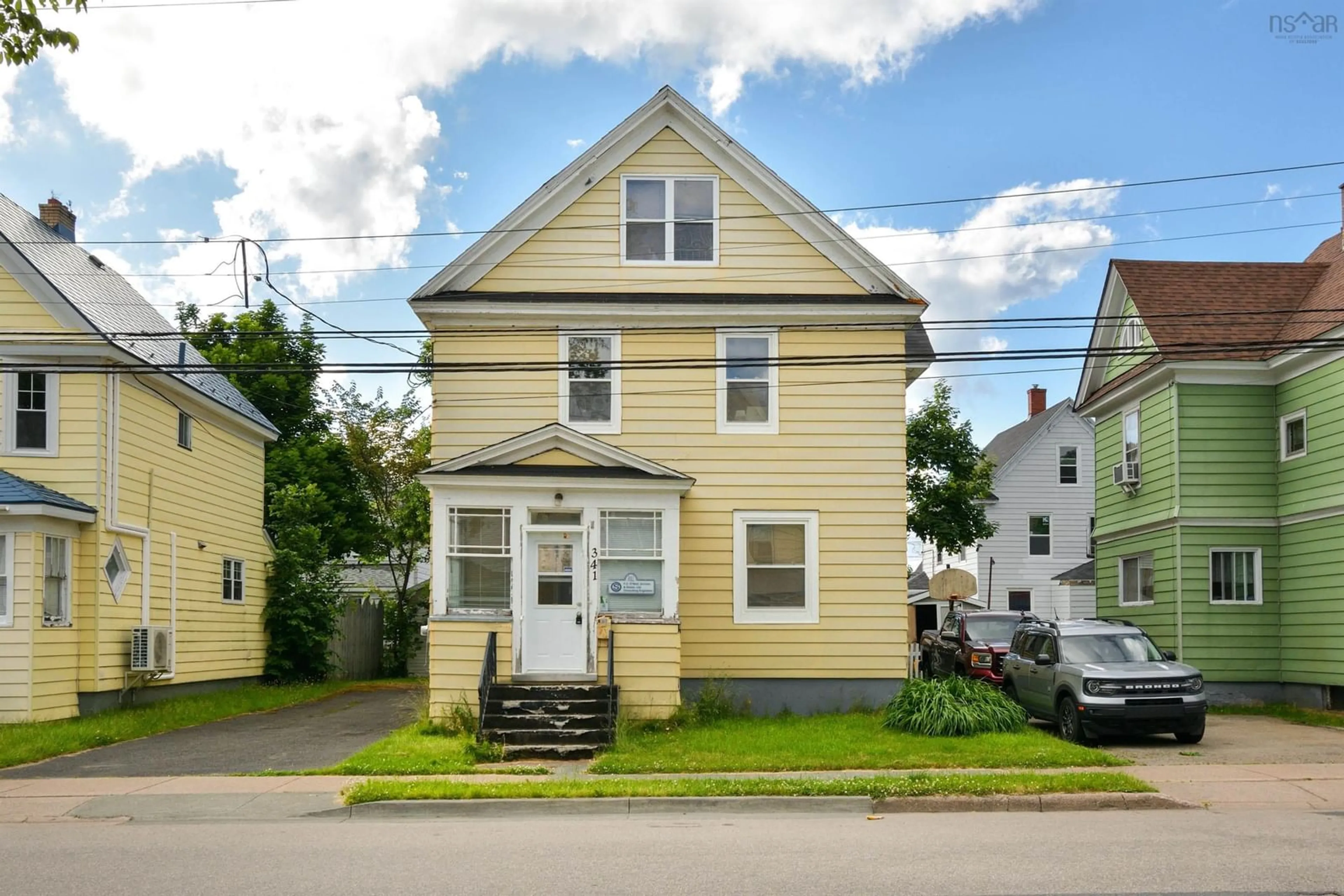 Home with vinyl exterior material, street for 341 Townsend St, Sydney Nova Scotia B1P 5G1