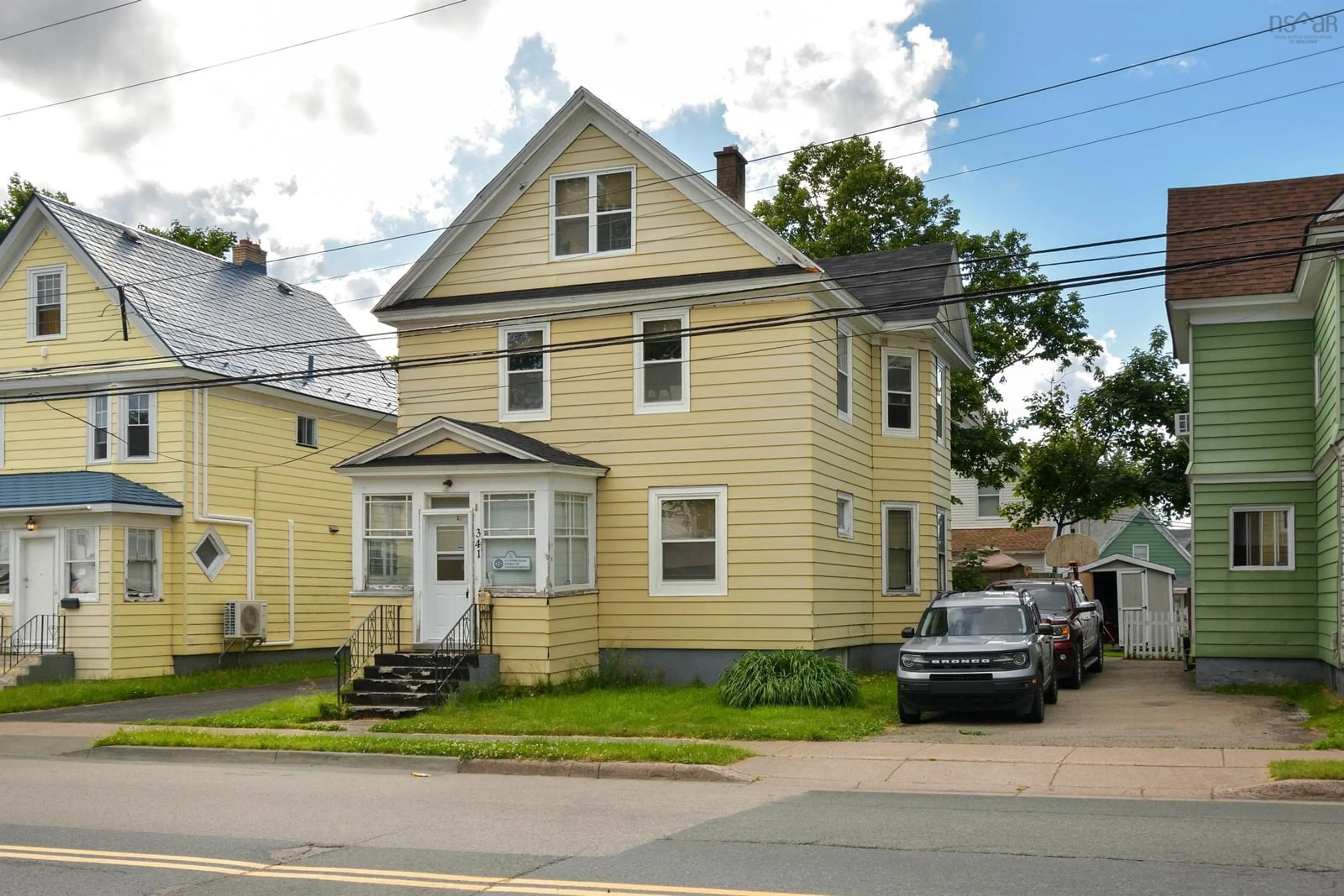 Home with vinyl exterior material, street for 341 Townsend St, Sydney Nova Scotia B1P 5G1