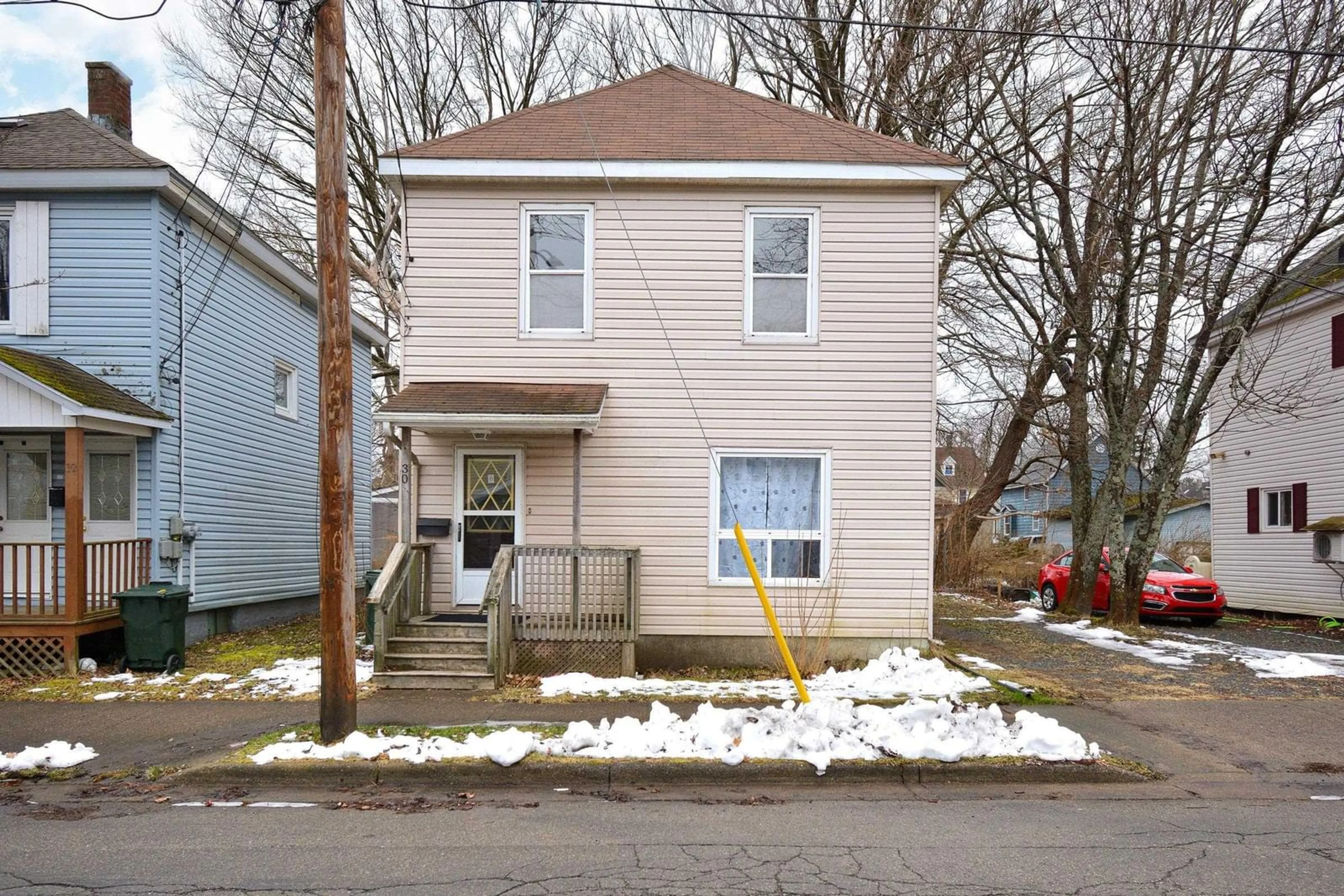 Home with vinyl exterior material, street for 30 Havelock St, Sydney Nova Scotia B1P 1R7