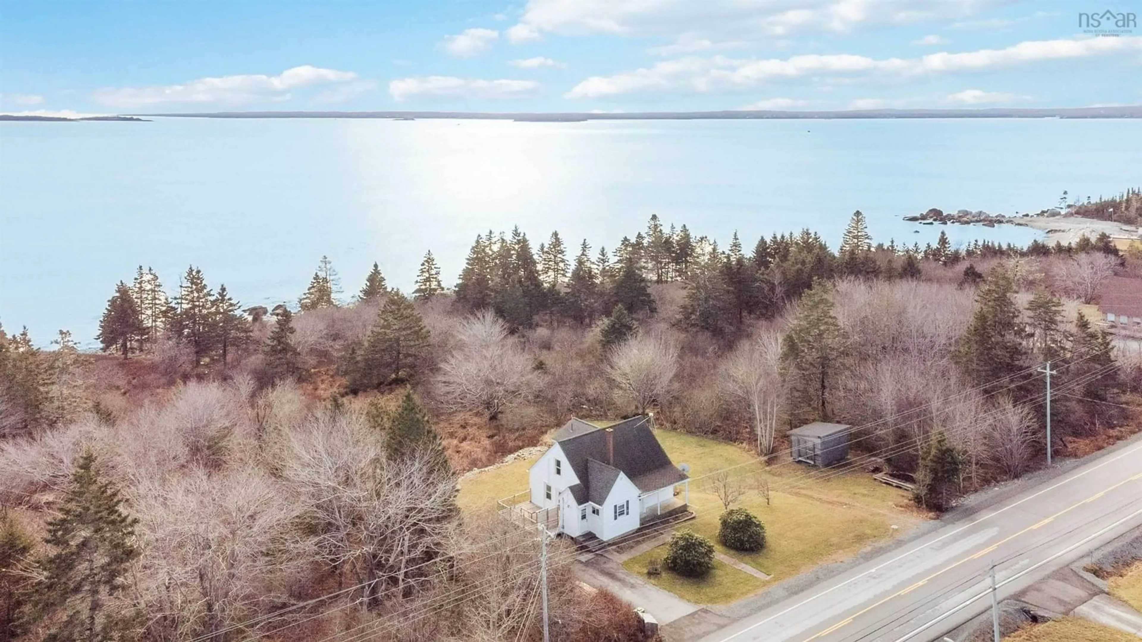 A pic from outside/outdoor area/front of a property/back of a property/a pic from drone, water/lake/river/ocean view for 6921 Highway 3, Hunts Point Nova Scotia B0T 1G0