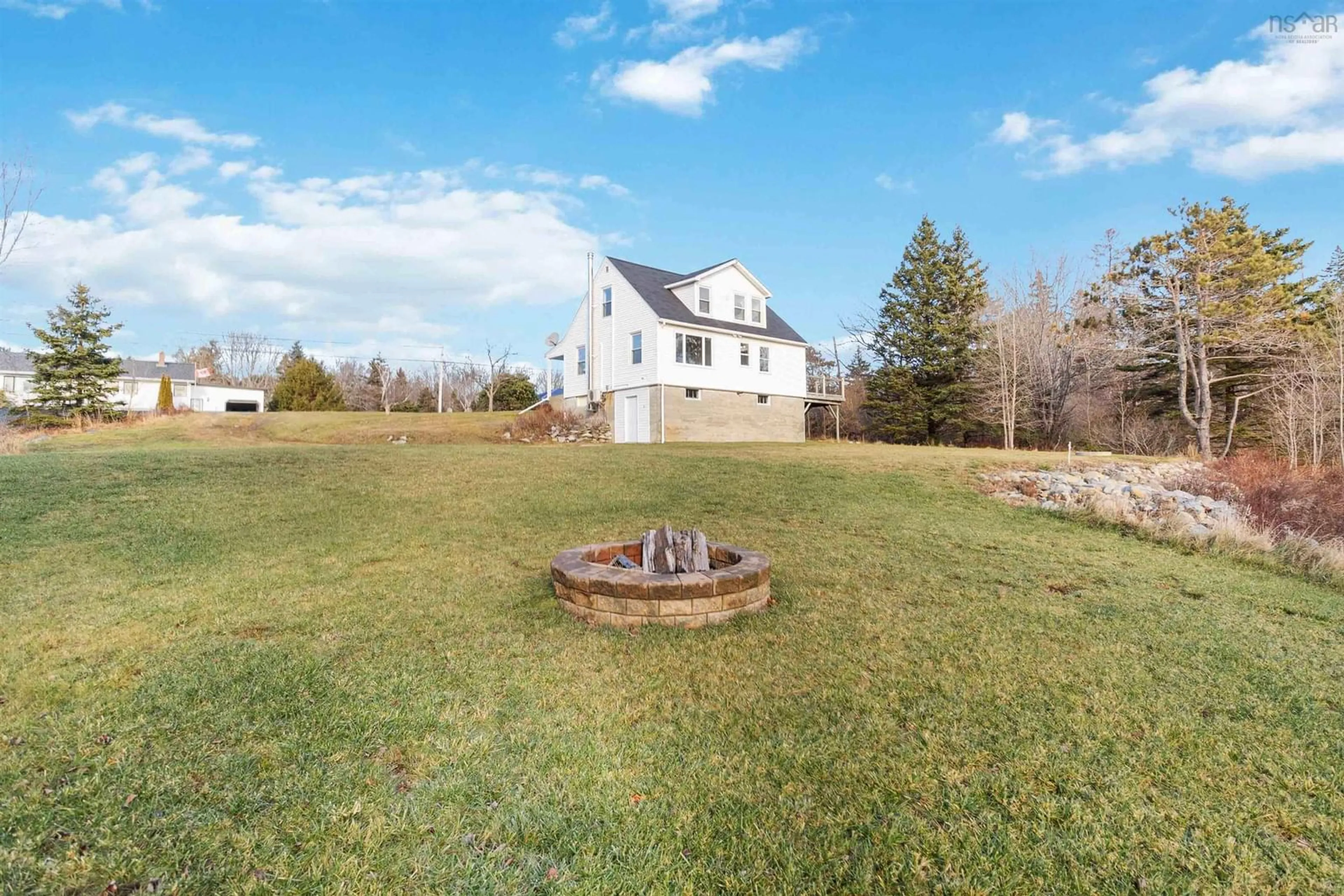 A pic from outside/outdoor area/front of a property/back of a property/a pic from drone, water/lake/river/ocean view for 6921 Highway 3, Hunts Point Nova Scotia B0T 1G0