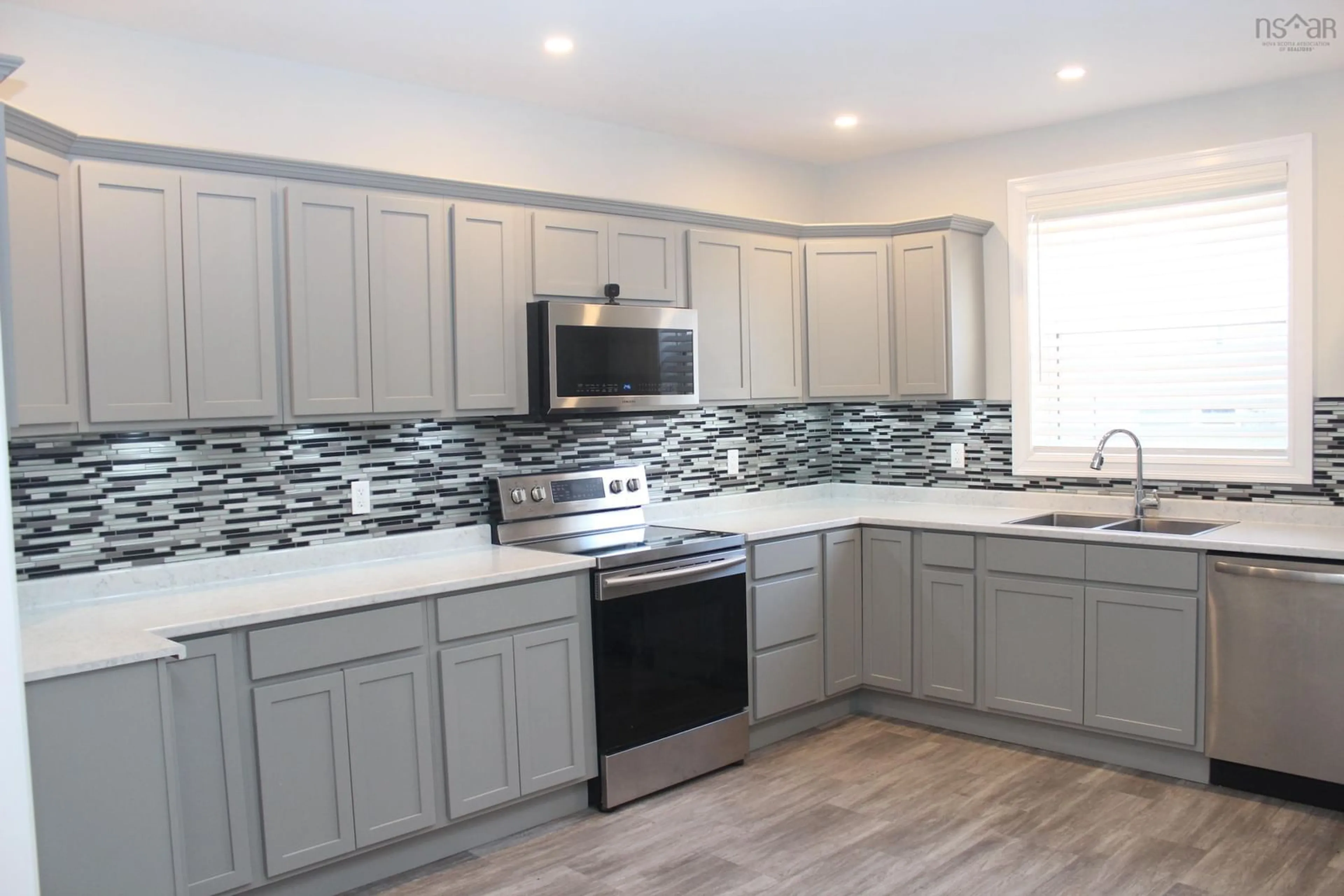 Open concept kitchen, ceramic/tile floor for 140 Victoria St, Glace Bay Nova Scotia B1A 2Z8