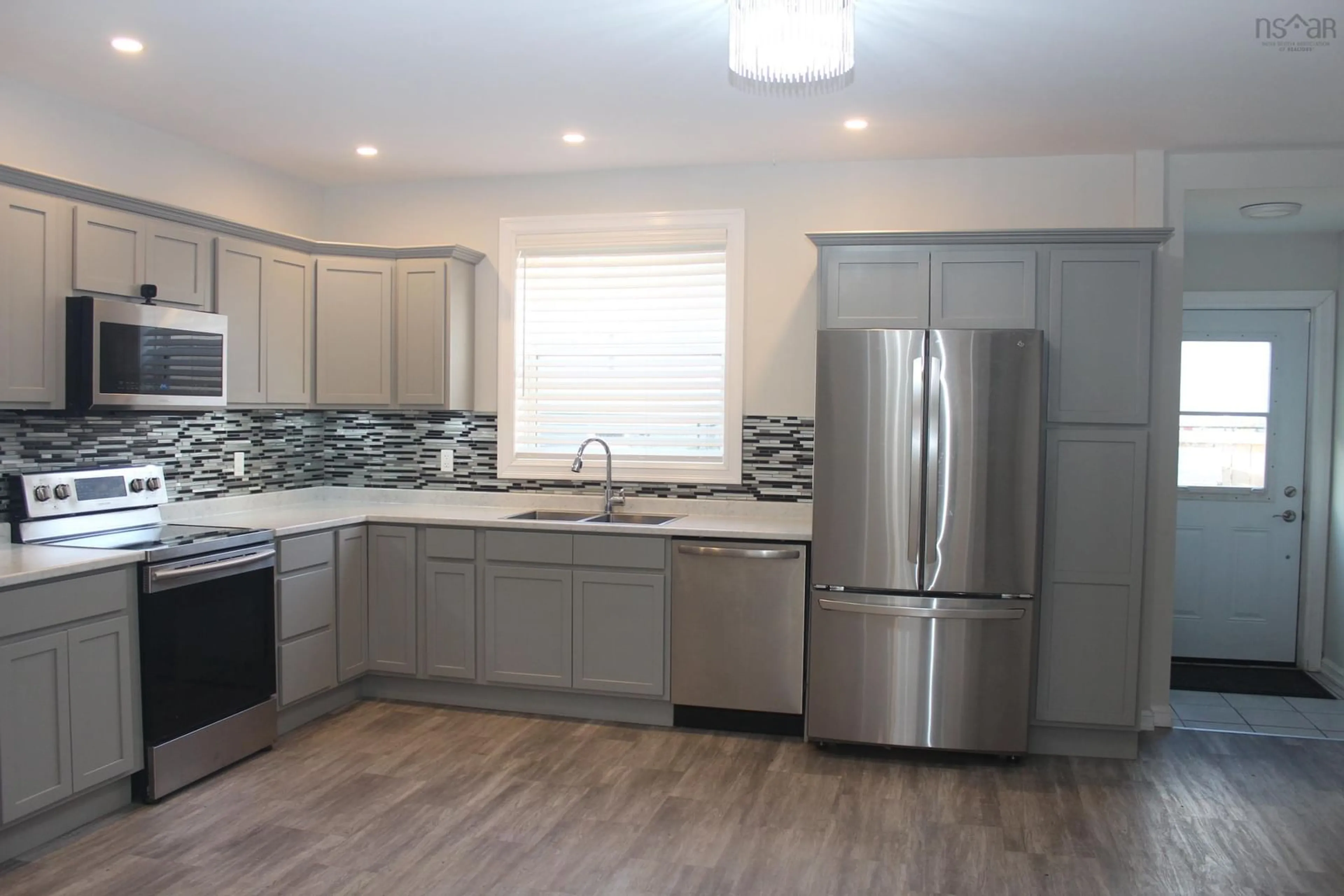 Open concept kitchen, unknown for 140 Victoria St, Glace Bay Nova Scotia B1A 2Z8