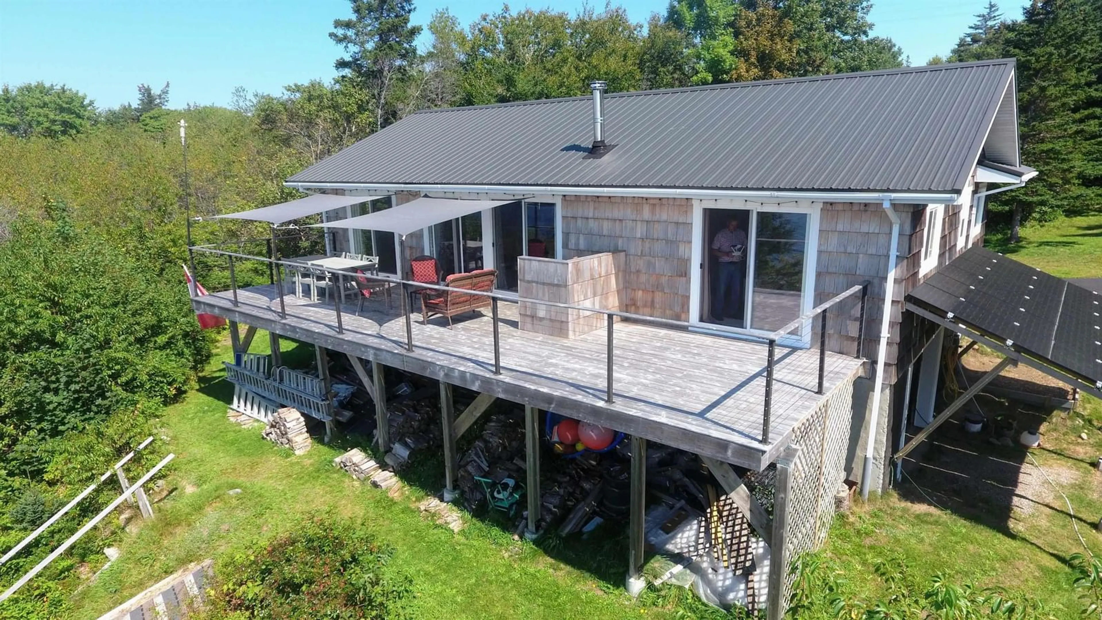 A pic from outside/outdoor area/front of a property/back of a property/a pic from drone, water/lake/river/ocean view for 1050 Sandy Point Rd, Sandy Point Nova Scotia B0T 1W0