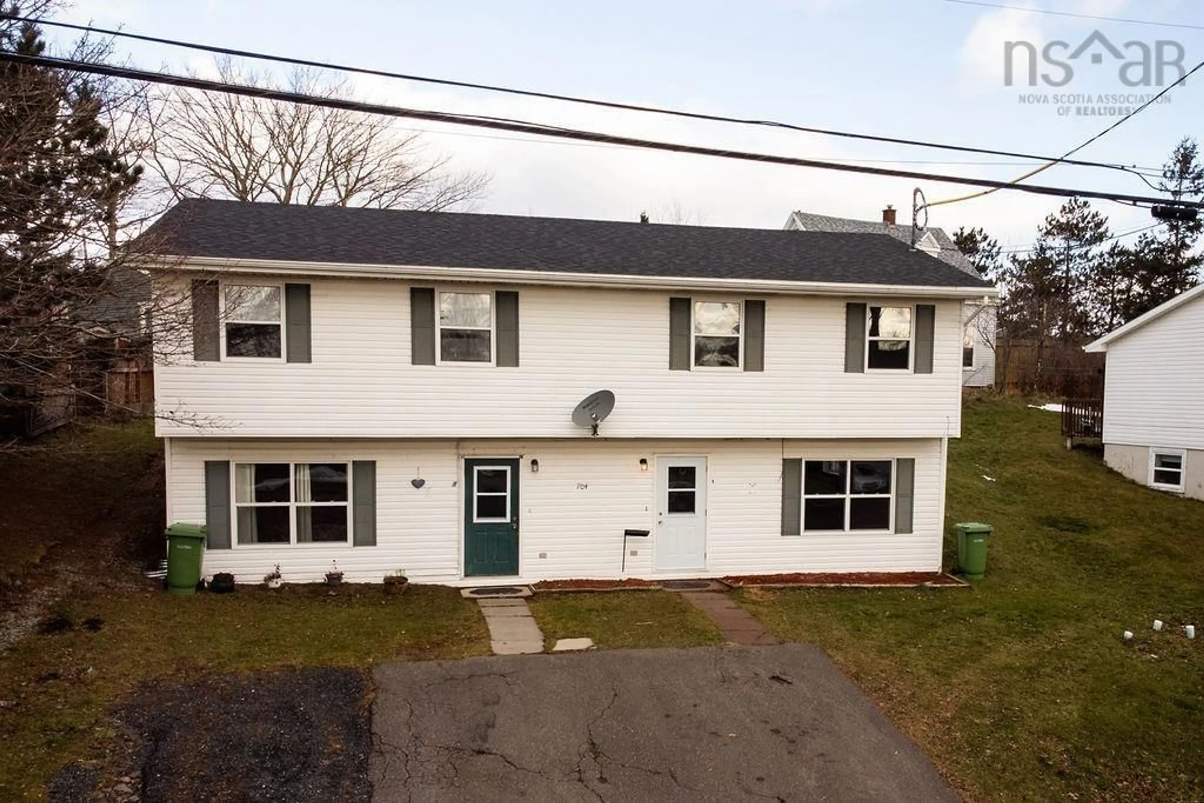 A pic from outside/outdoor area/front of a property/back of a property/a pic from drone, street for 704 Queen St, Port Hawkesbury Nova Scotia B9A 2W8