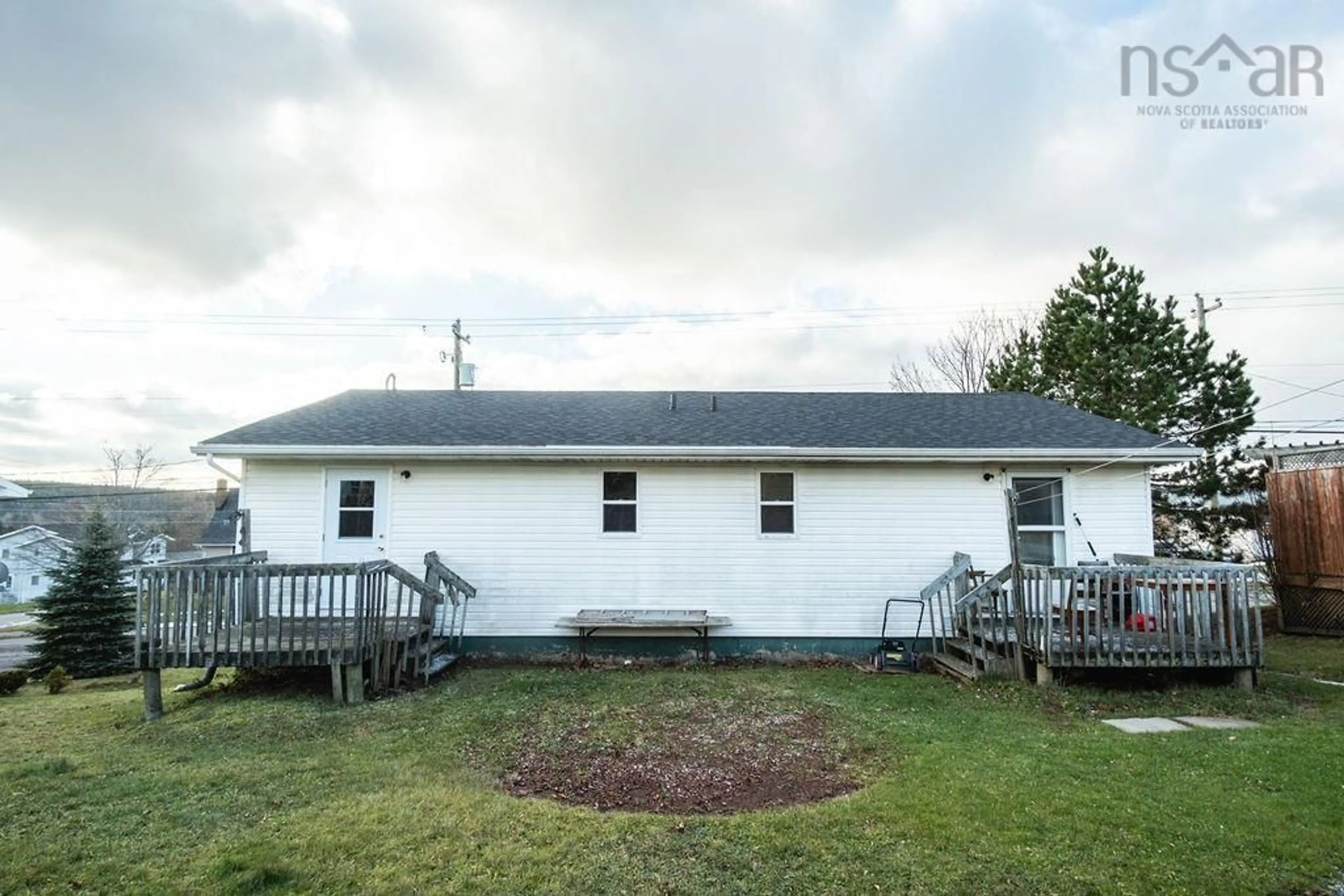 A pic from outside/outdoor area/front of a property/back of a property/a pic from drone, building for 704 Queen St, Port Hawkesbury Nova Scotia B9A 2W8