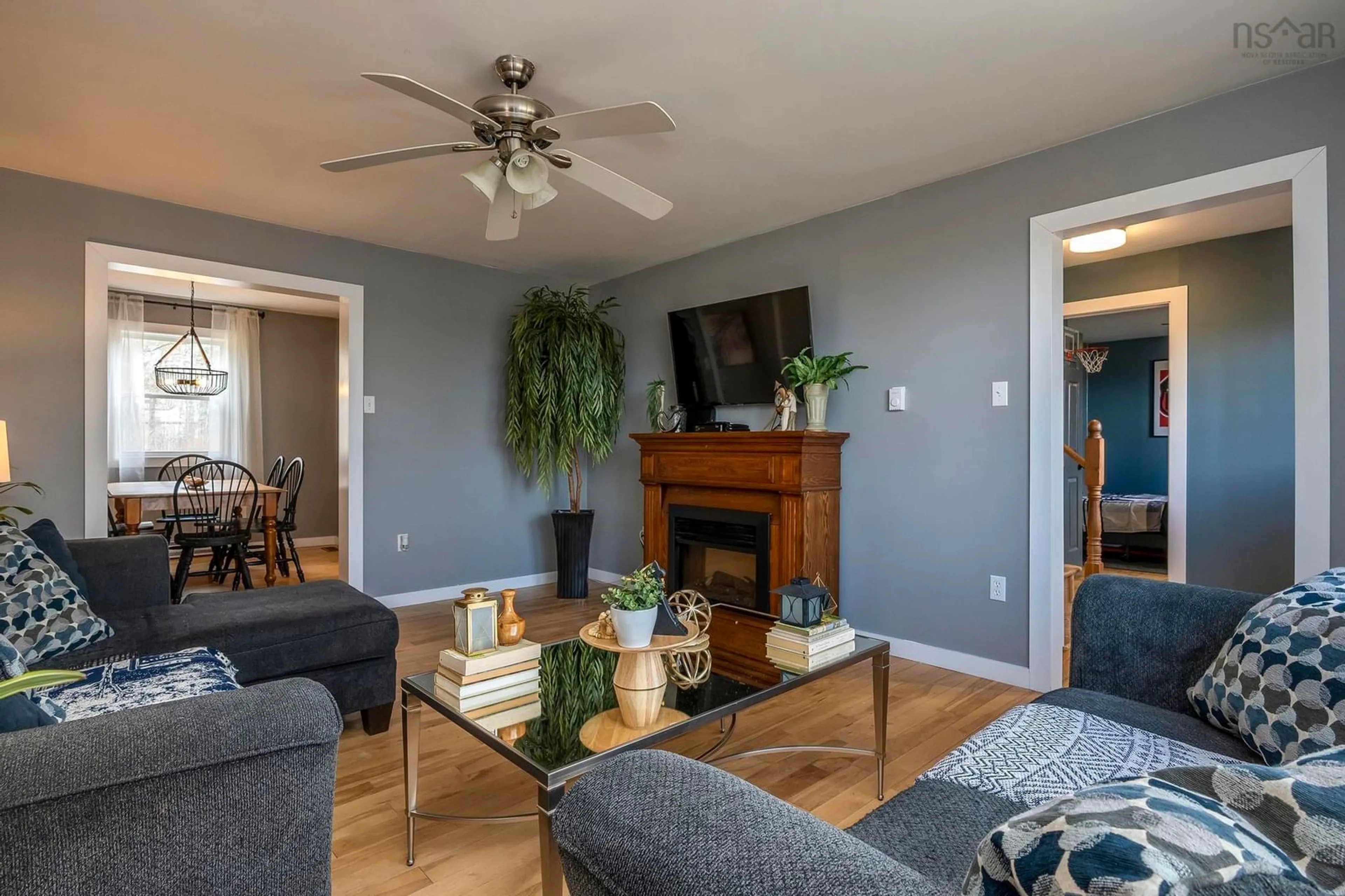 Living room with furniture, wood/laminate floor for 8322 Highway 14, McKay Section Nova Scotia B0N 2A0