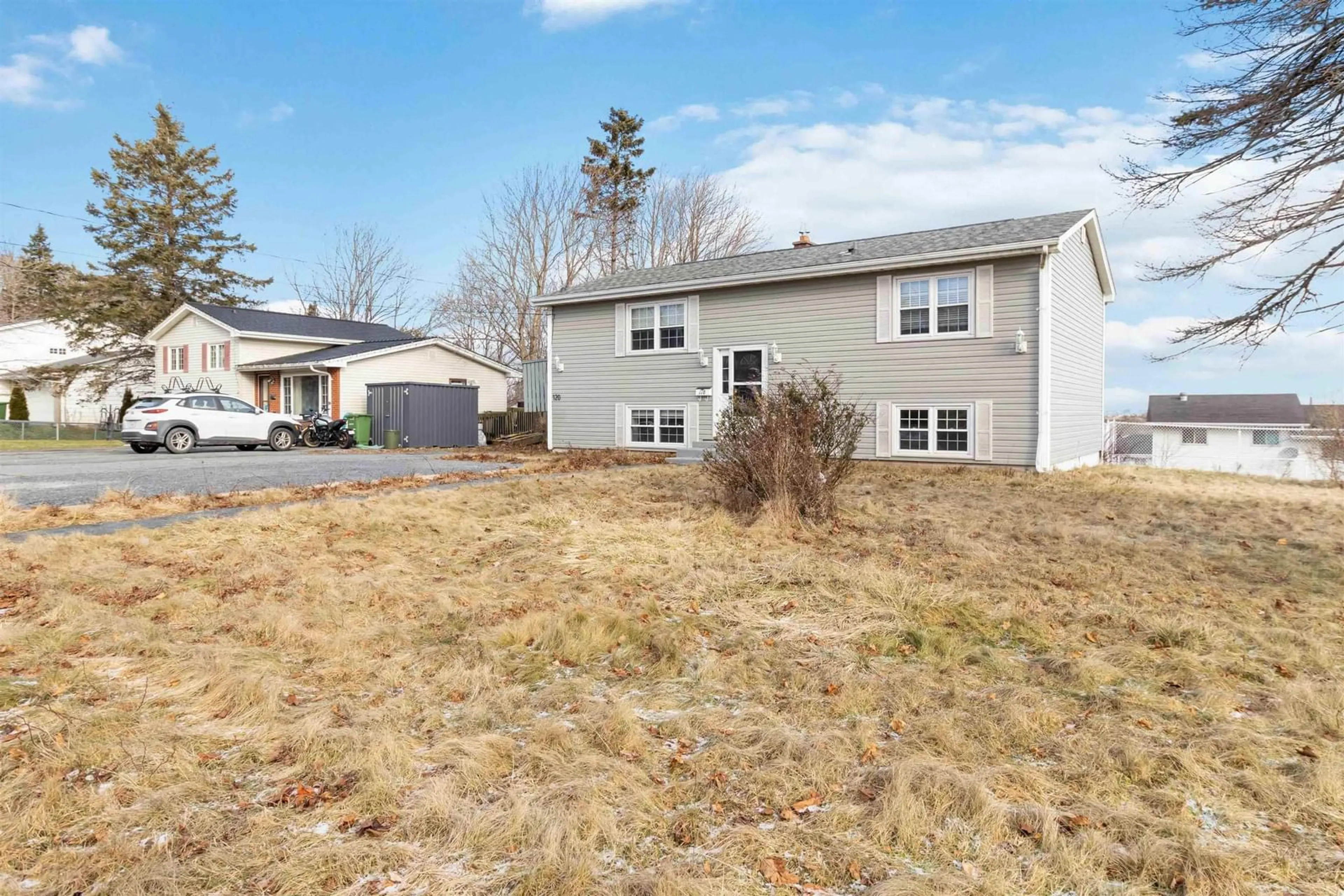 A pic from outside/outdoor area/front of a property/back of a property/a pic from drone, street for 118/120 Tartan Ave, Spryfield Nova Scotia B3R 2B9