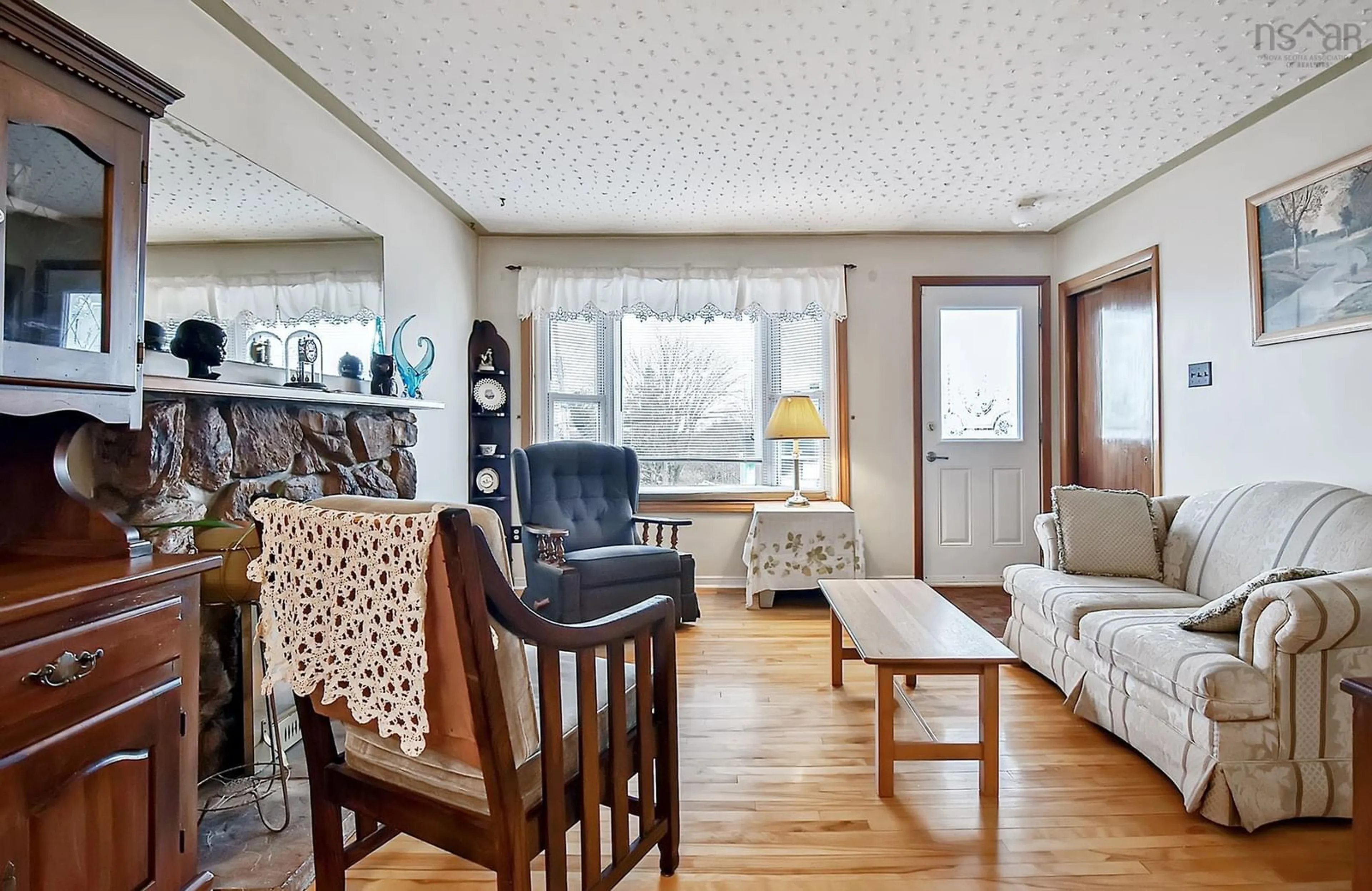 Living room with furniture, wood/laminate floor for 24 Edmond Drive, Dartmouth Nova Scotia B2W 2K2