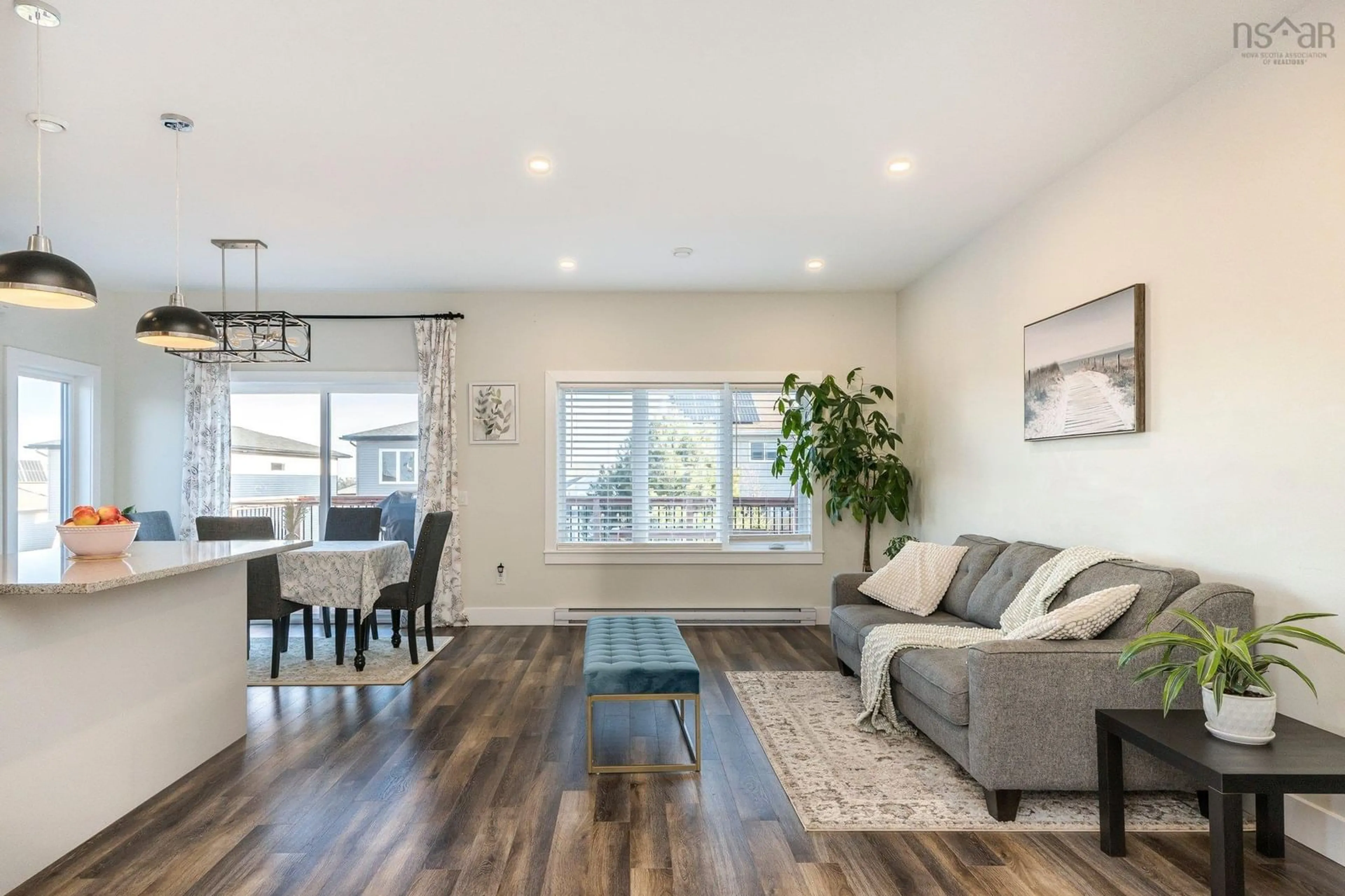 Living room with furniture, wood/laminate floor for 15 Thorngrove Lane, Timberlea Nova Scotia B3T 0K1