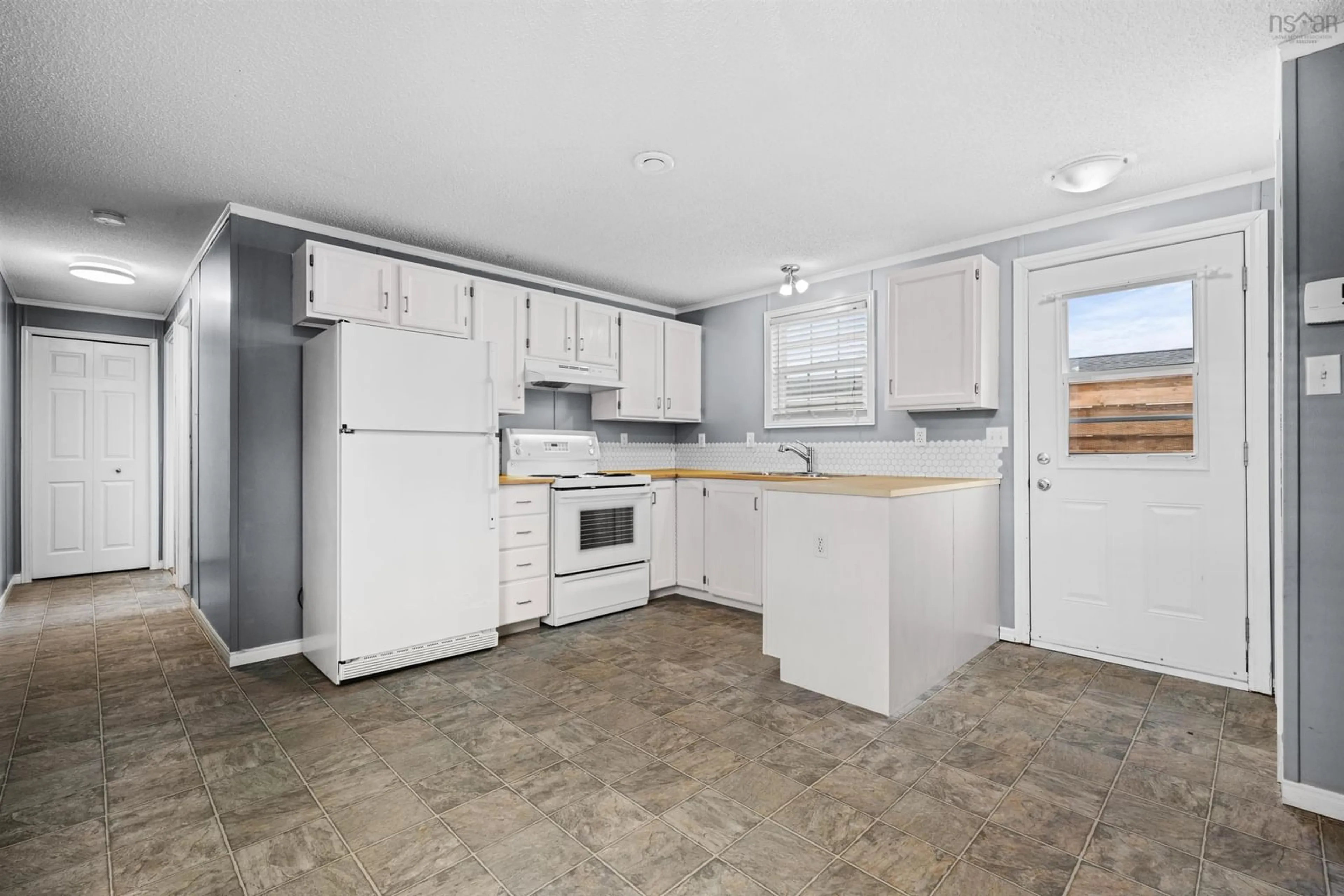 Standard kitchen, ceramic/tile floor for 90 Bumpy Lane, Lake Echo Nova Scotia B3E 1B8