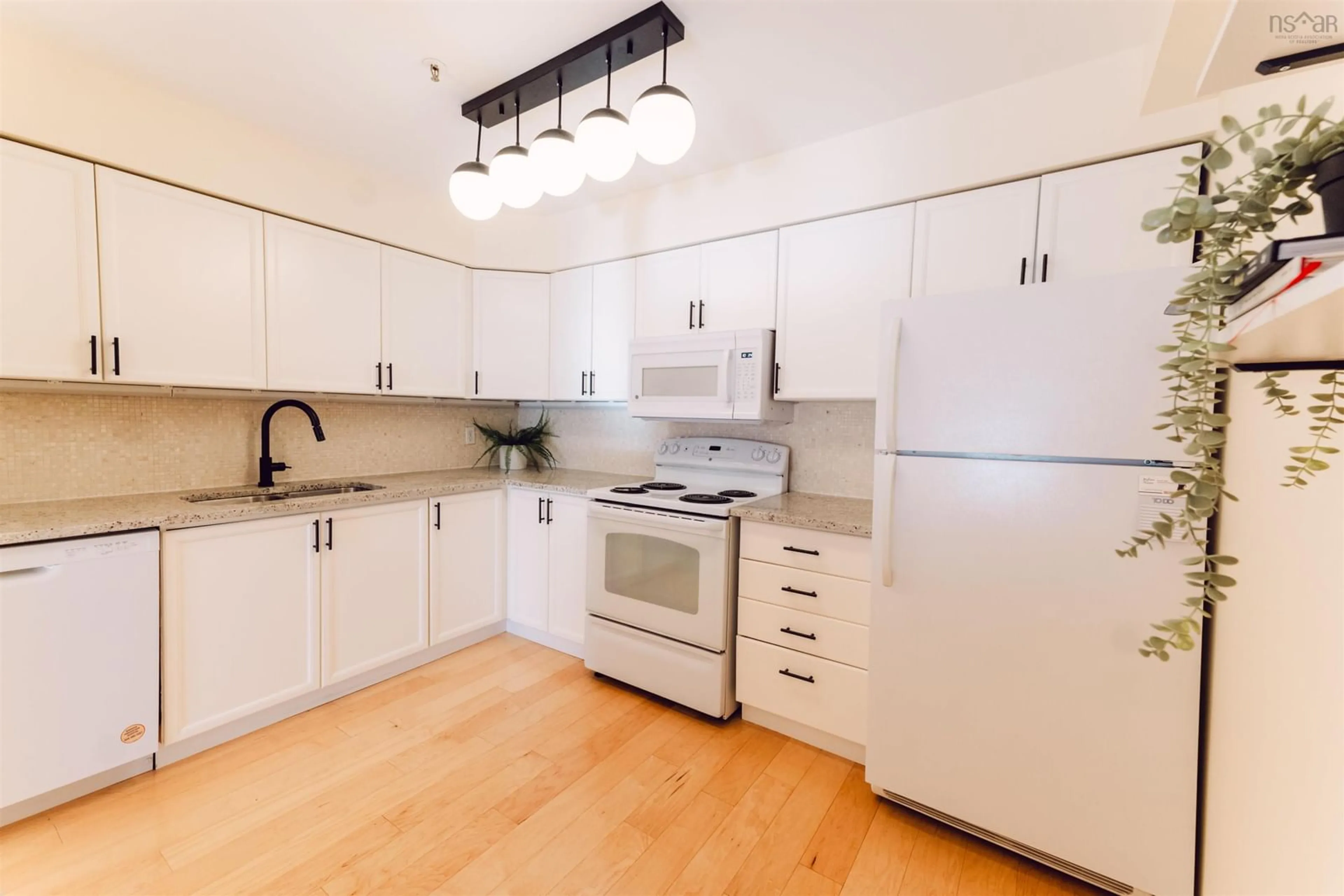 Standard kitchen, wood/laminate floor for 5230 Tobin St #409, Halifax Nova Scotia B3H 1S2