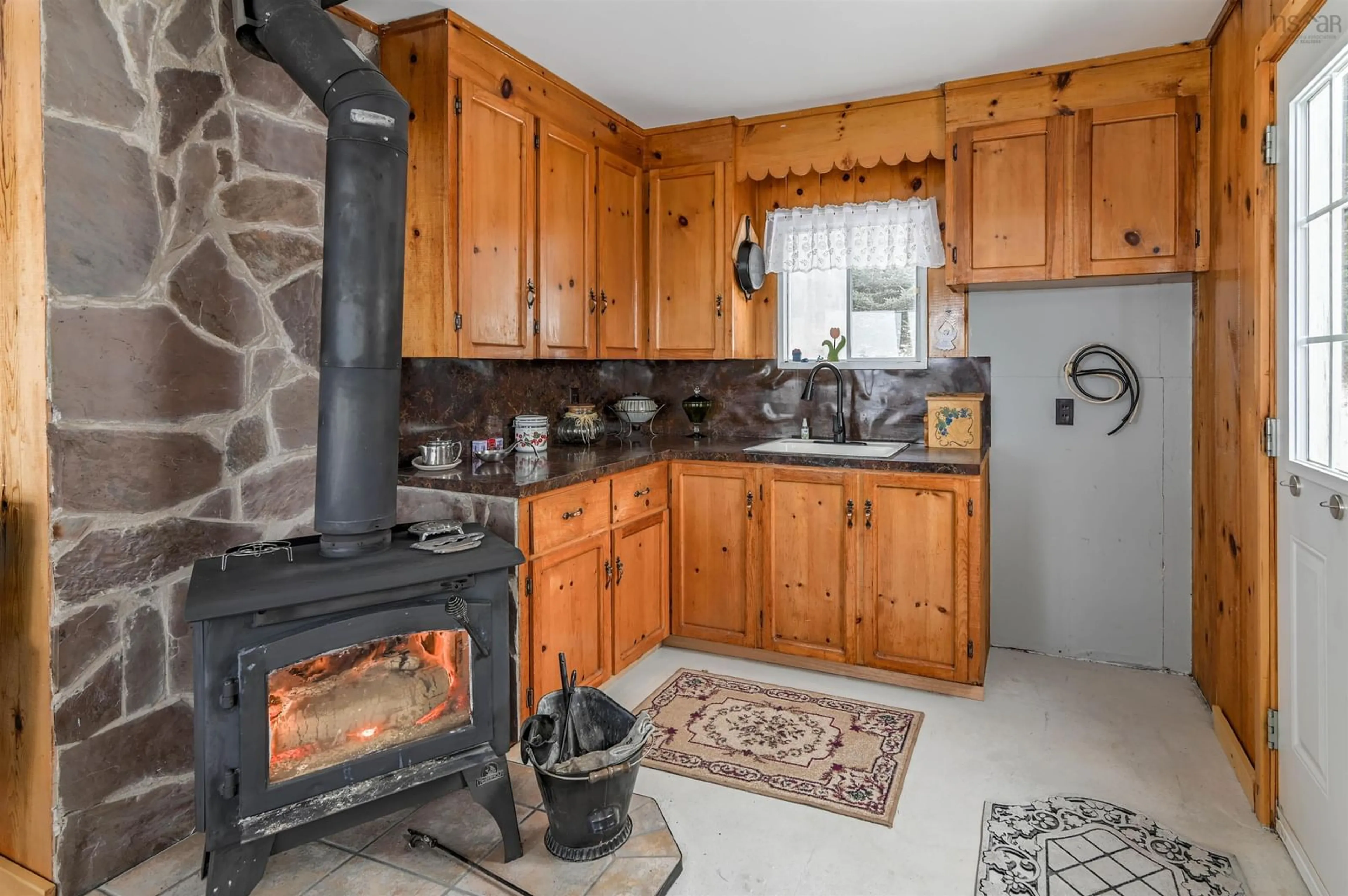 Standard kitchen, ceramic/tile floor for 931 Old Baxter Mill Rd, Baxters Harbour Nova Scotia B0P 1H0