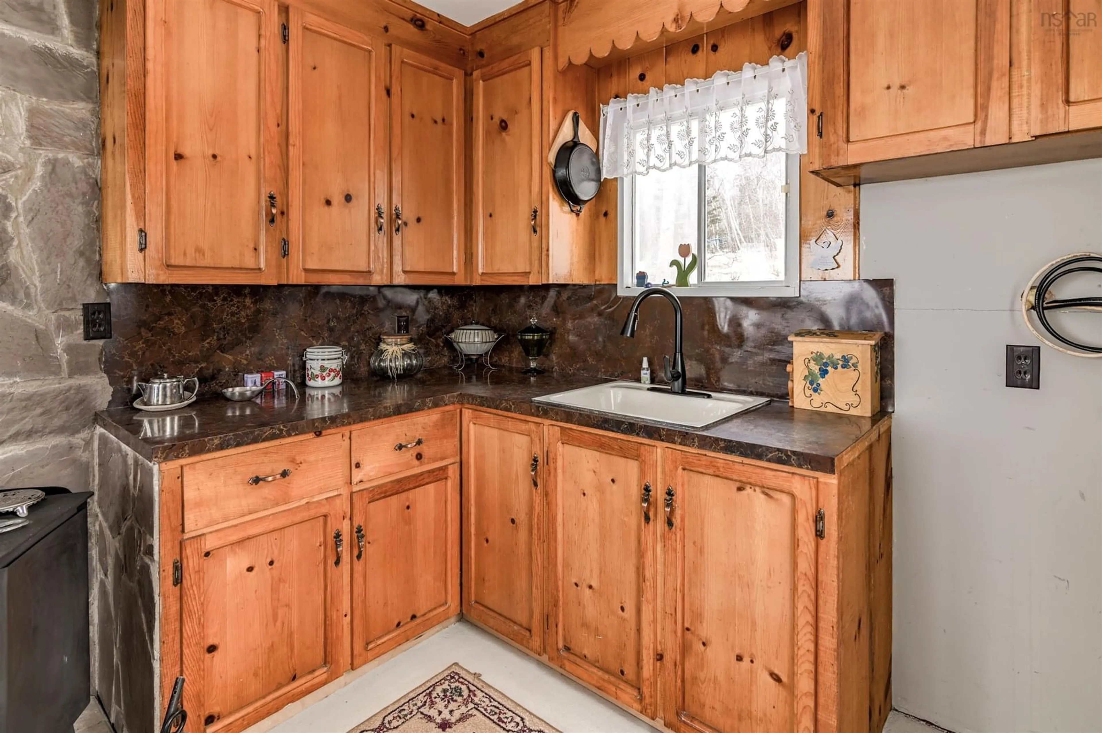 Standard kitchen, ceramic/tile floor for 931 Old Baxter Mill Rd, Baxters Harbour Nova Scotia B0P 1H0