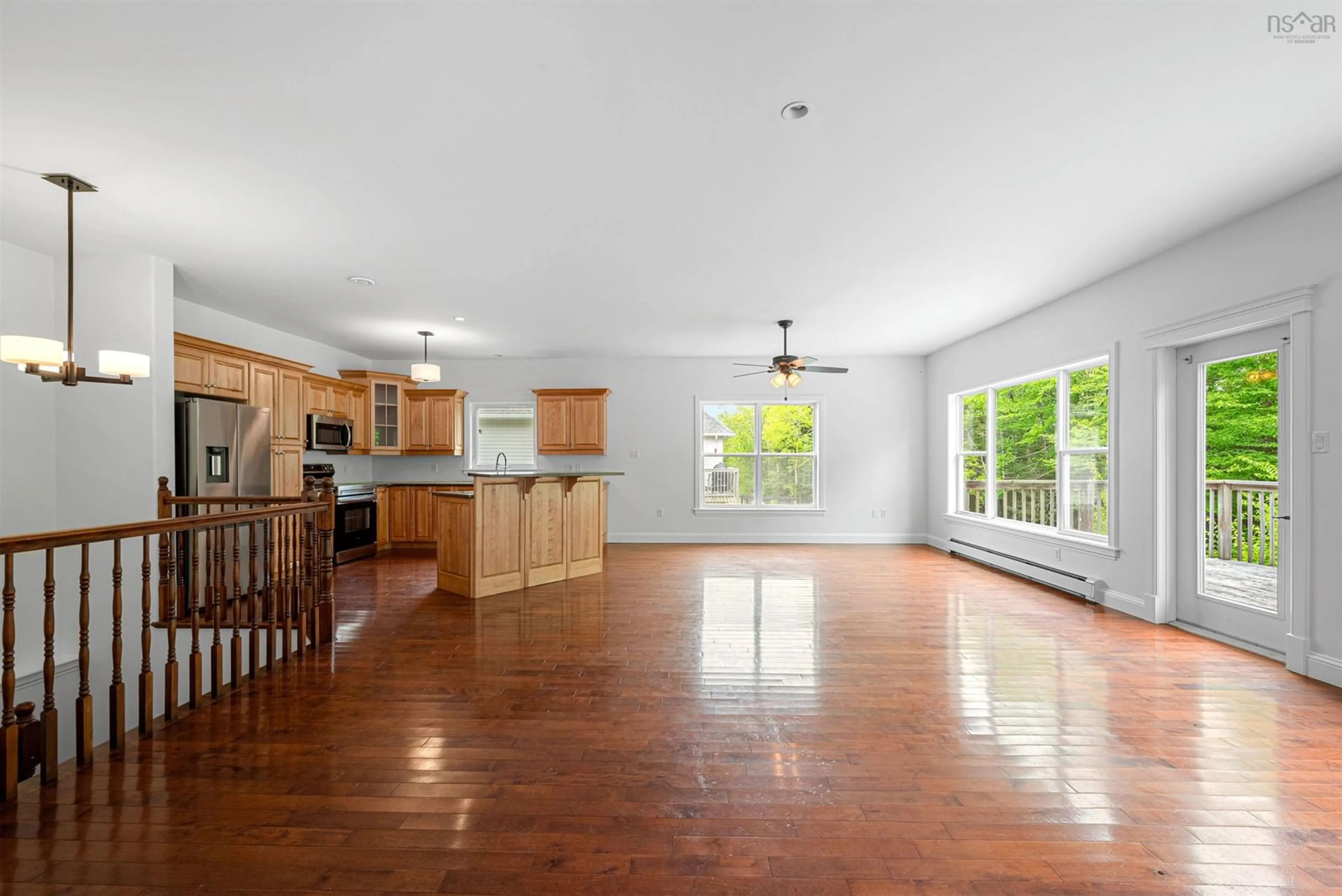 Open concept kitchen, wood/laminate floor for 139 Carnoustie Drive, Hammonds Plains Nova Scotia B4B 0E5