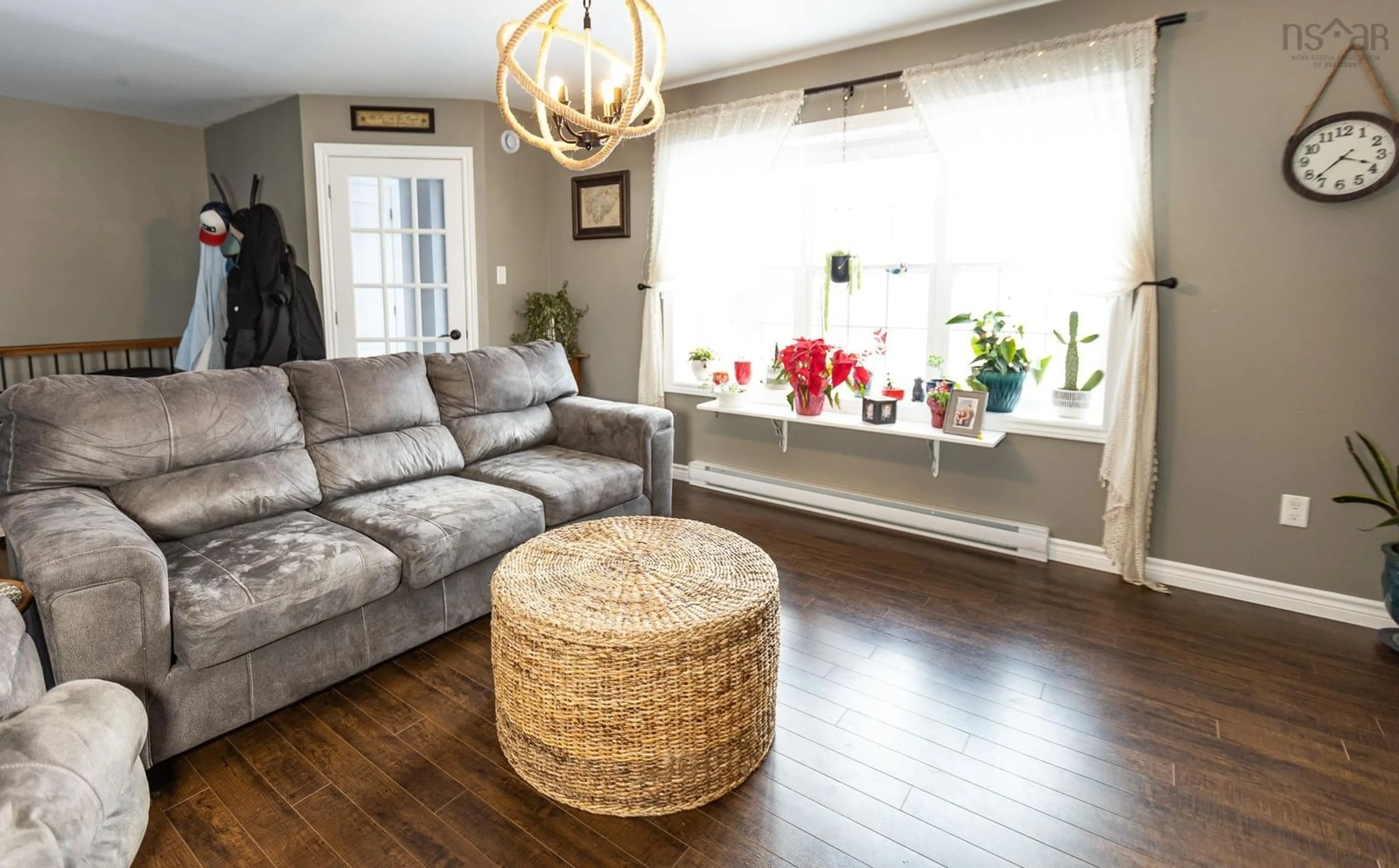 Living room with furniture, wood/laminate floor for 741 Villagedale Rd, Coffinscroft Nova Scotia B0W 1E0