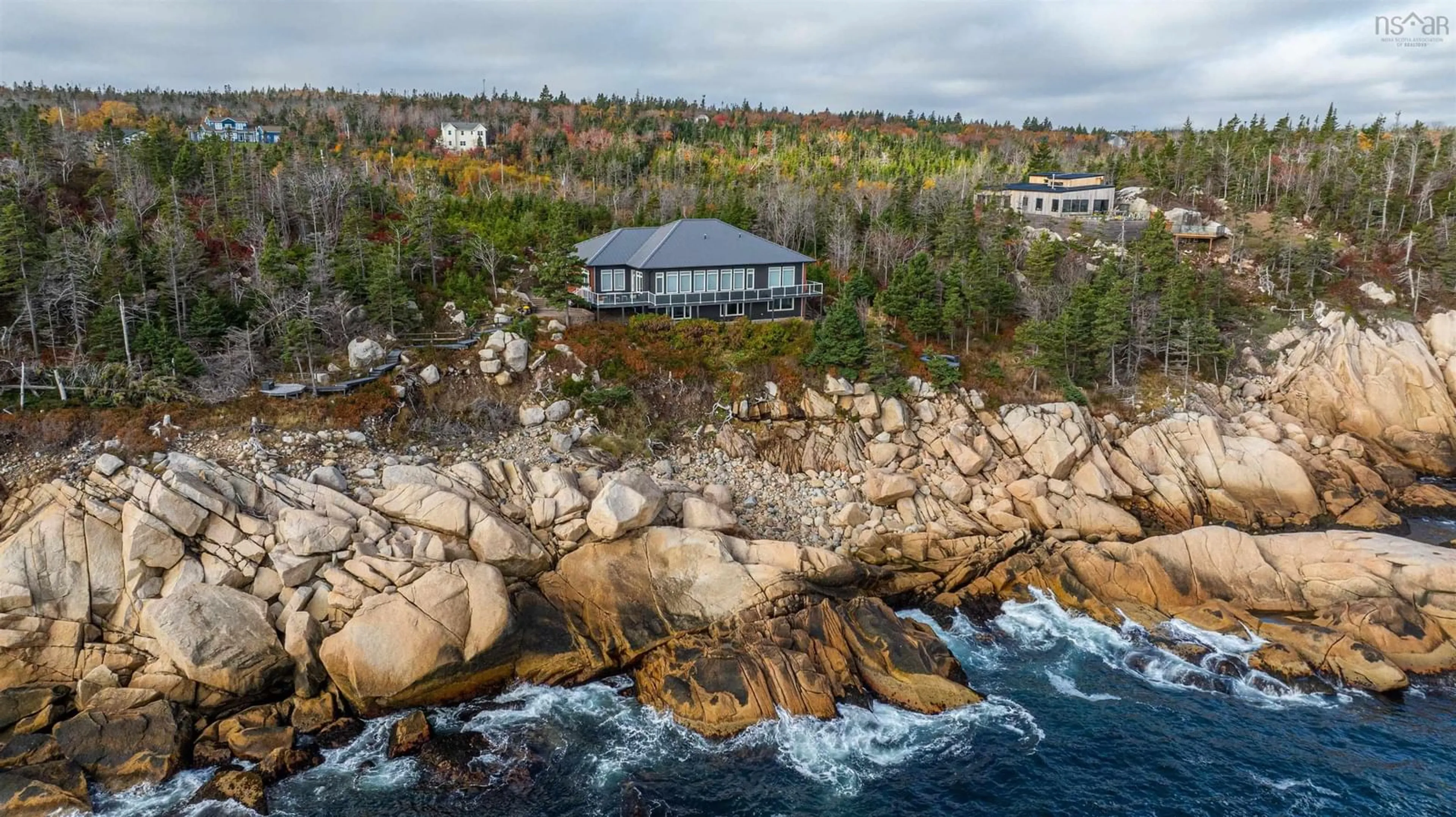 A pic from outside/outdoor area/front of a property/back of a property/a pic from drone, water/lake/river/ocean view for 71 Kittiwake Ridge, Halibut Bay Nova Scotia B3V 1R1