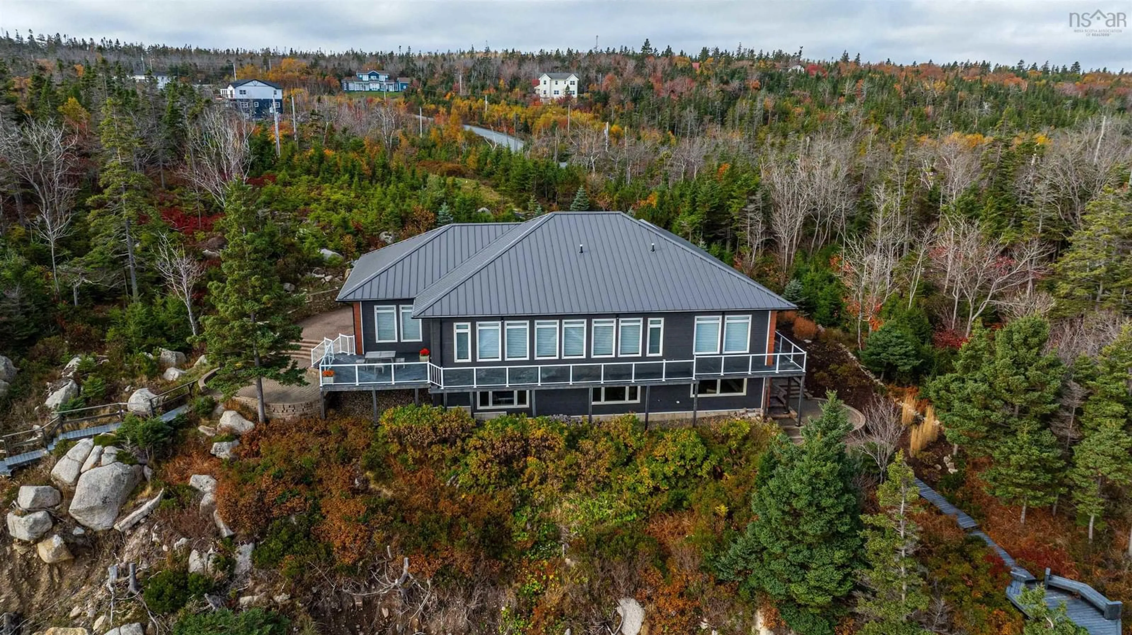 A pic from outside/outdoor area/front of a property/back of a property/a pic from drone, water/lake/river/ocean view for 71 Kittiwake Ridge, Halibut Bay Nova Scotia B3V 1R1