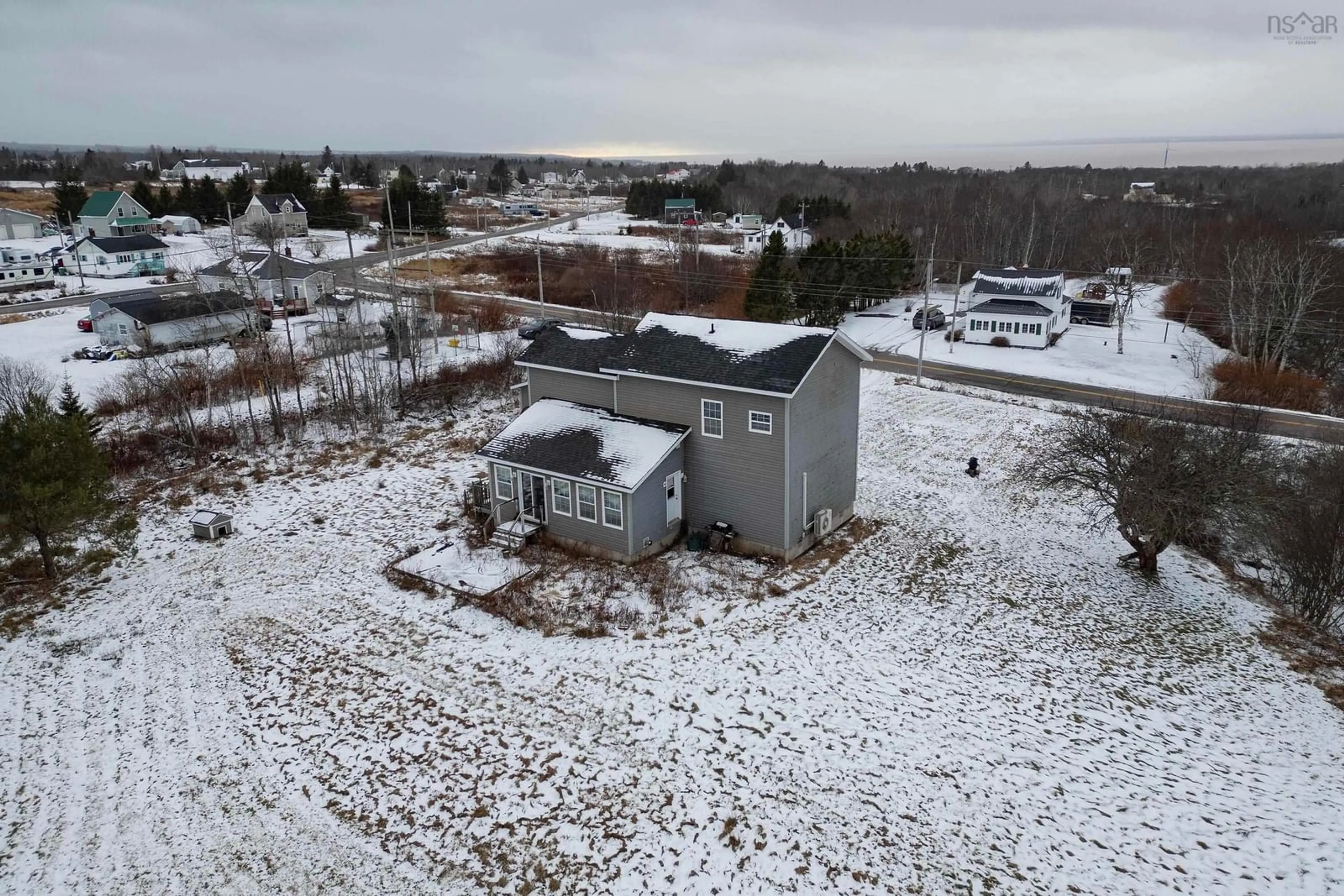 A pic from outside/outdoor area/front of a property/back of a property/a pic from drone, building for 16 Lower Cove Rd, Joggins Nova Scotia B0L 1A0