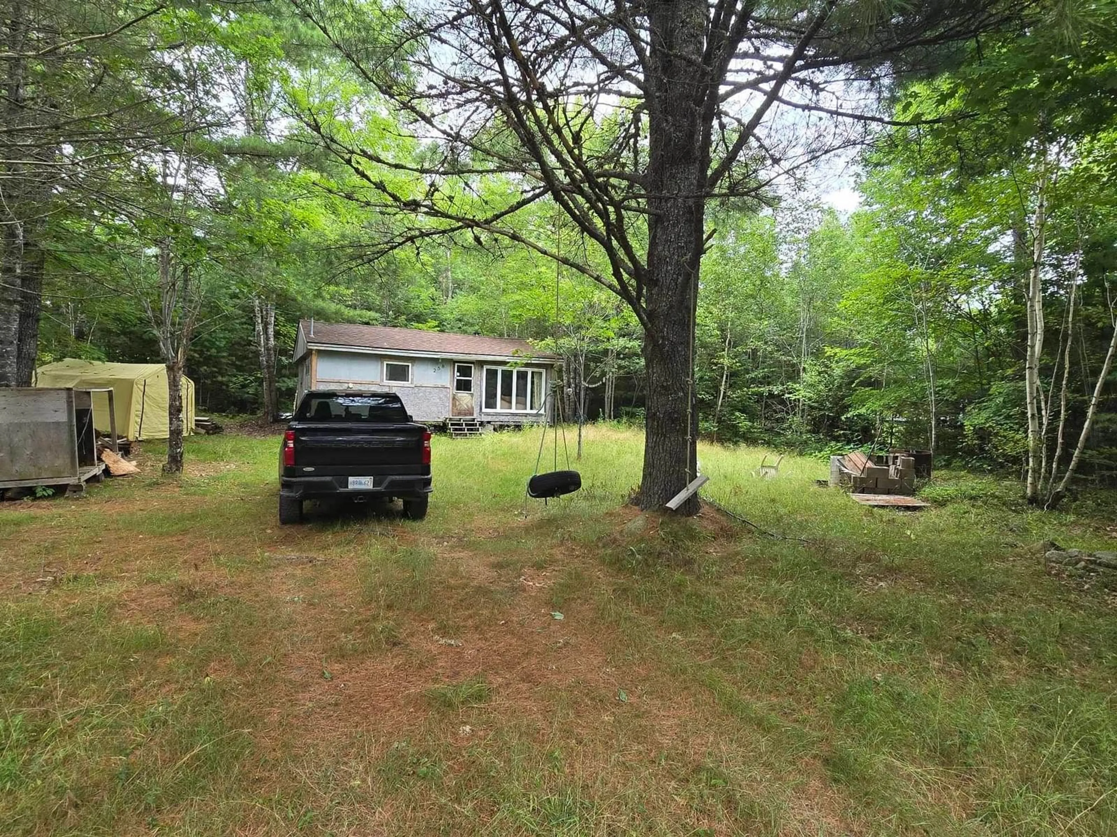 A pic from outside/outdoor area/front of a property/back of a property/a pic from drone, forest/trees view for 258 Brandy Lane, North River Nova Scotia B0R 1E0