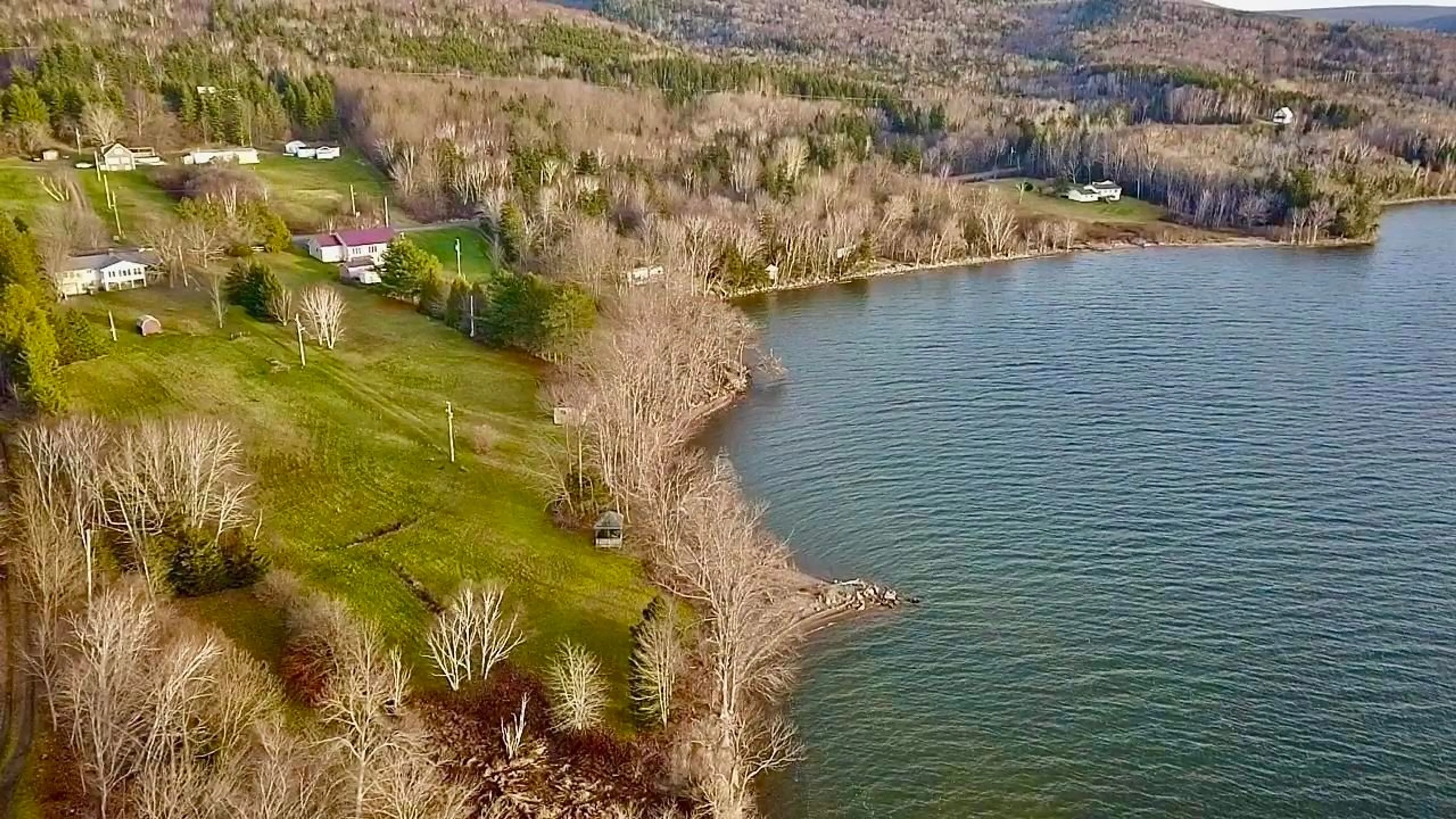 A pic from outside/outdoor area/front of a property/back of a property/a pic from drone, water/lake/river/ocean view for 2957 Highway 395 East Lake Ainslie, East Lake Ainslie Nova Scotia B0E 3M0