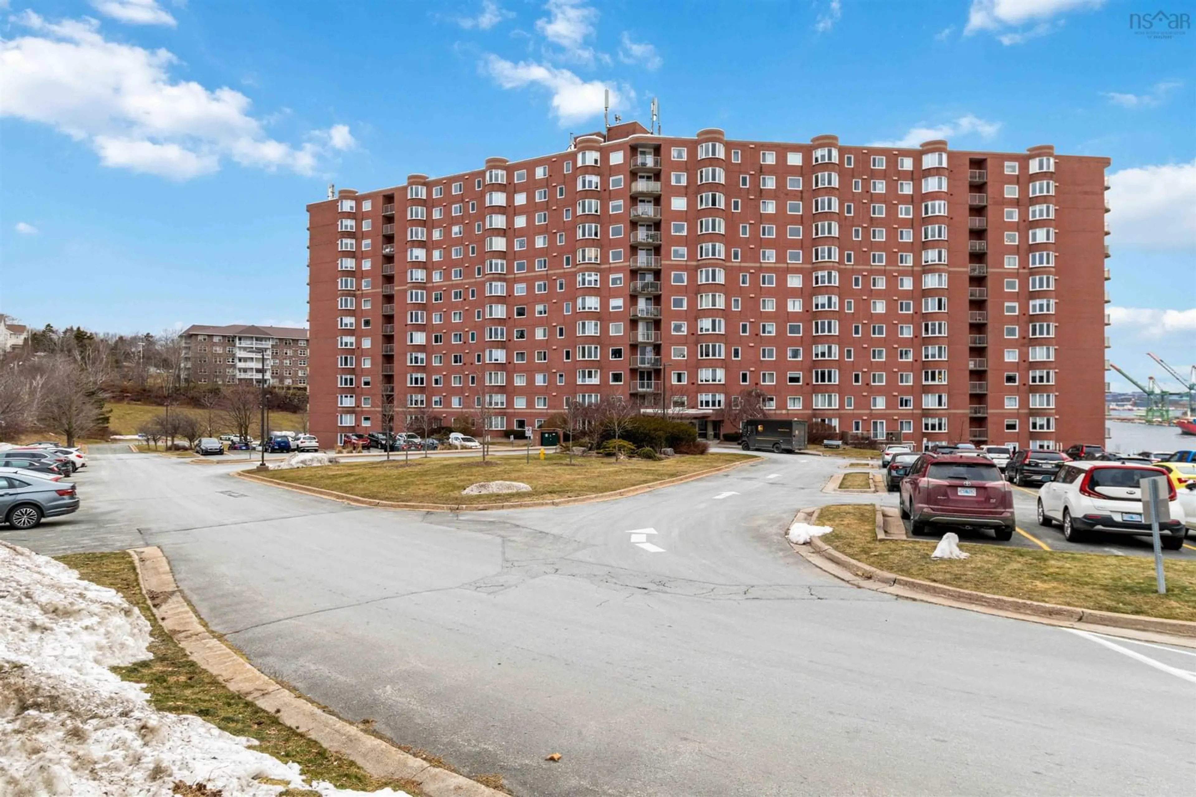 A pic from outside/outdoor area/front of a property/back of a property/a pic from drone, street for 45 Vimy Ave #917, Halifax Nova Scotia B3M 4C5