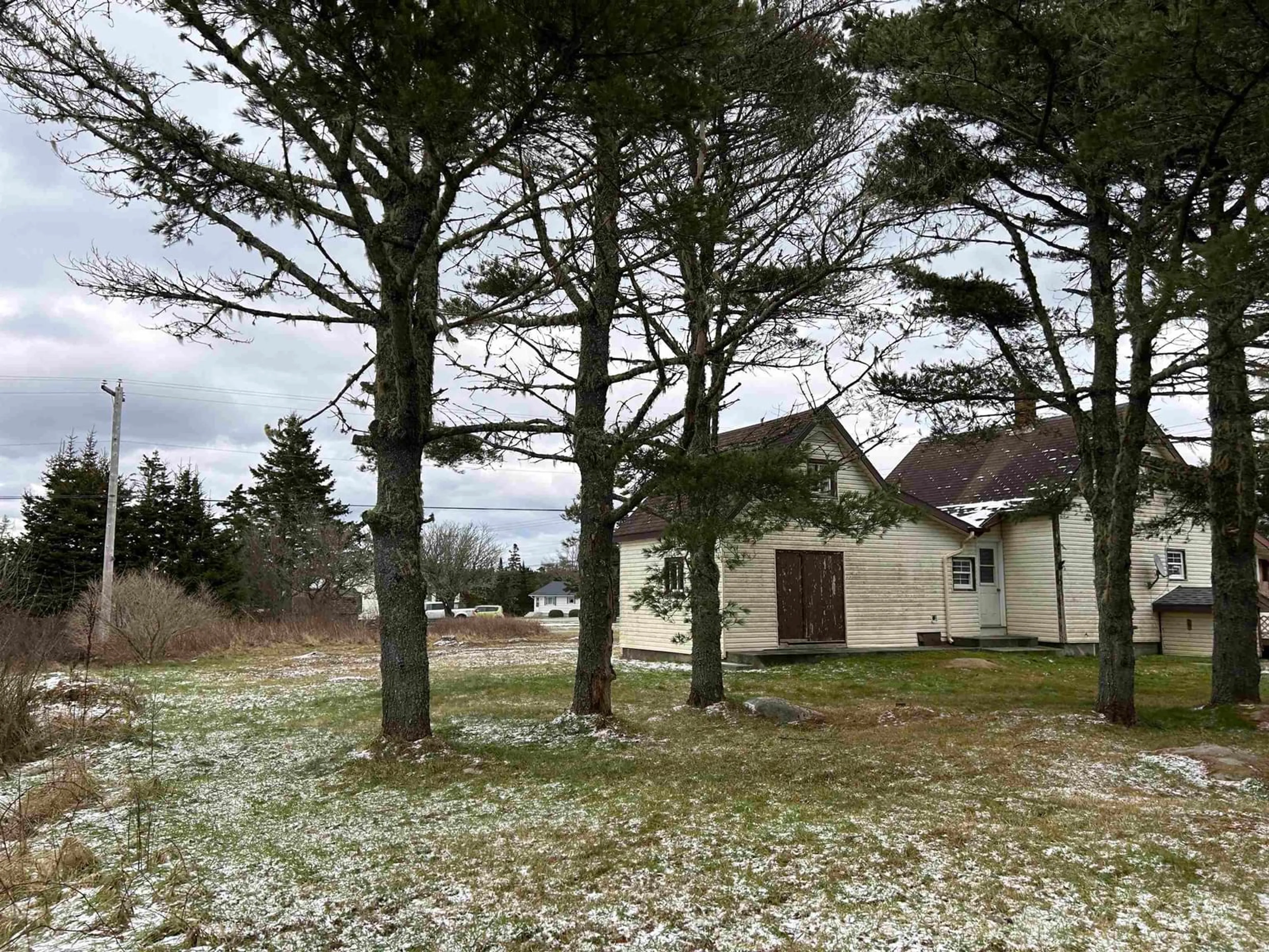 A pic from outside/outdoor area/front of a property/back of a property/a pic from drone, forest/trees view for 7 Goodwin Lane, North East Point, Barrington Nova Scotia B0W 3J0