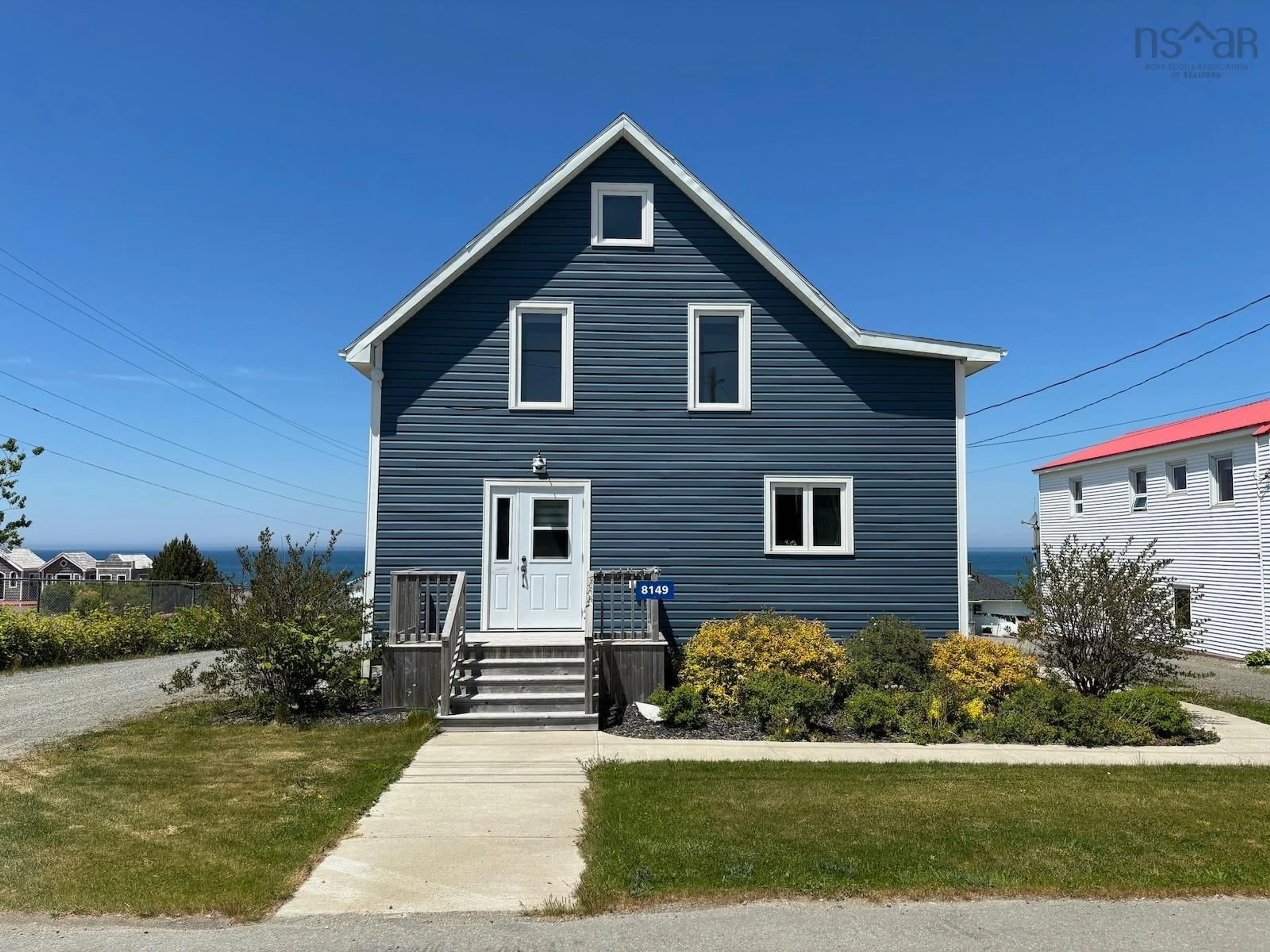 Home with vinyl exterior material, street for 8149 1 Hwy, Meteghan Centre Nova Scotia B0W 2J0