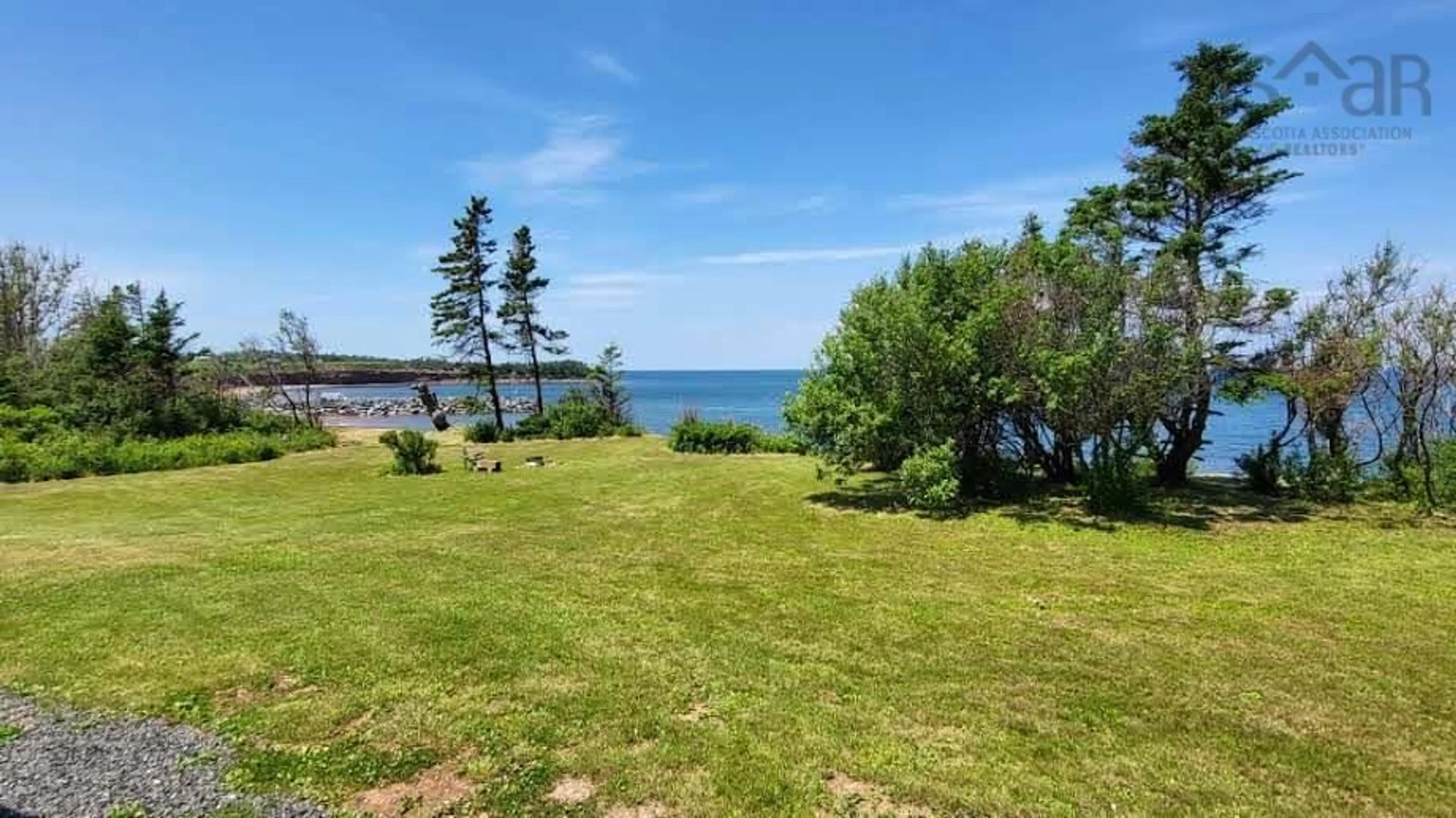 A pic from outside/outdoor area/front of a property/back of a property/a pic from drone, water/lake/river/ocean view for 120 Skinners Cove East Rd, Melville Nova Scotia B0K 1N0