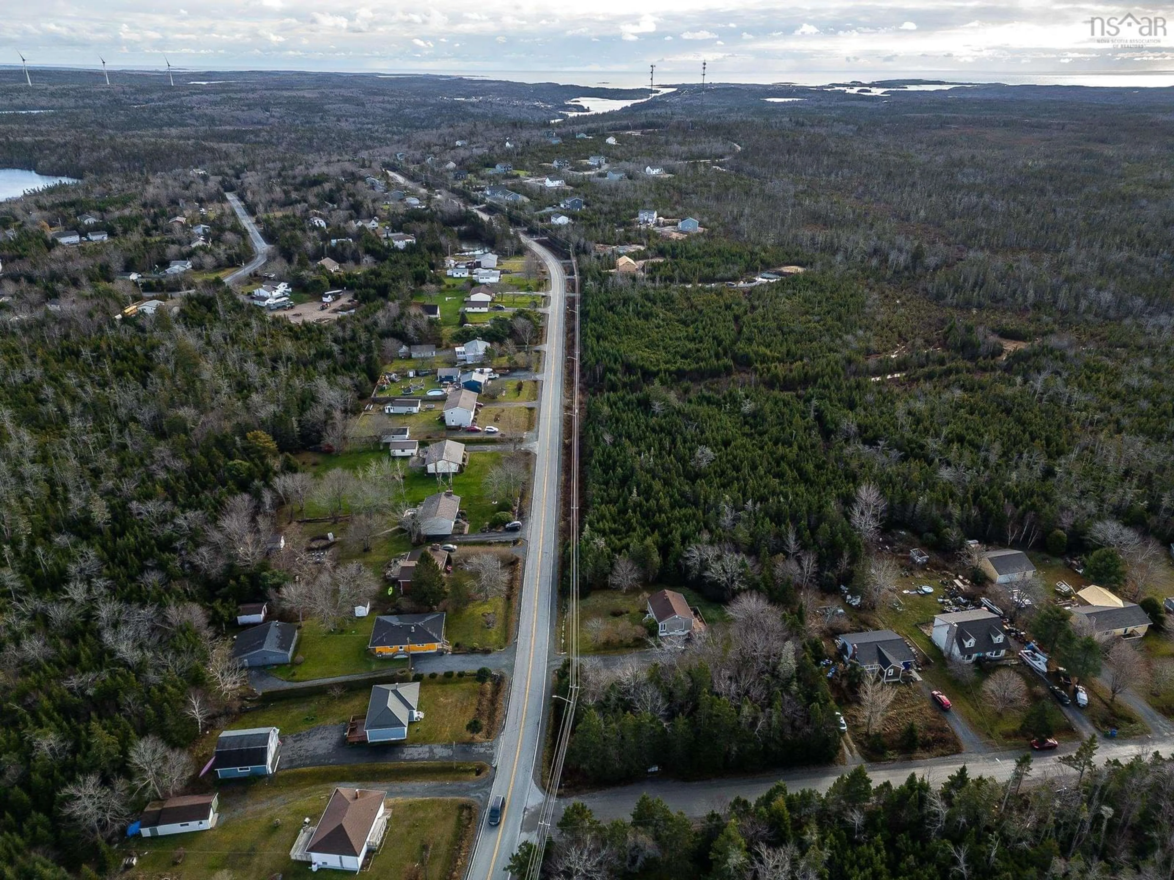 A pic from outside/outdoor area/front of a property/back of a property/a pic from drone, street for Lot 33 Terence Bay Rd, Whites Lake Nova Scotia B3T 1W8