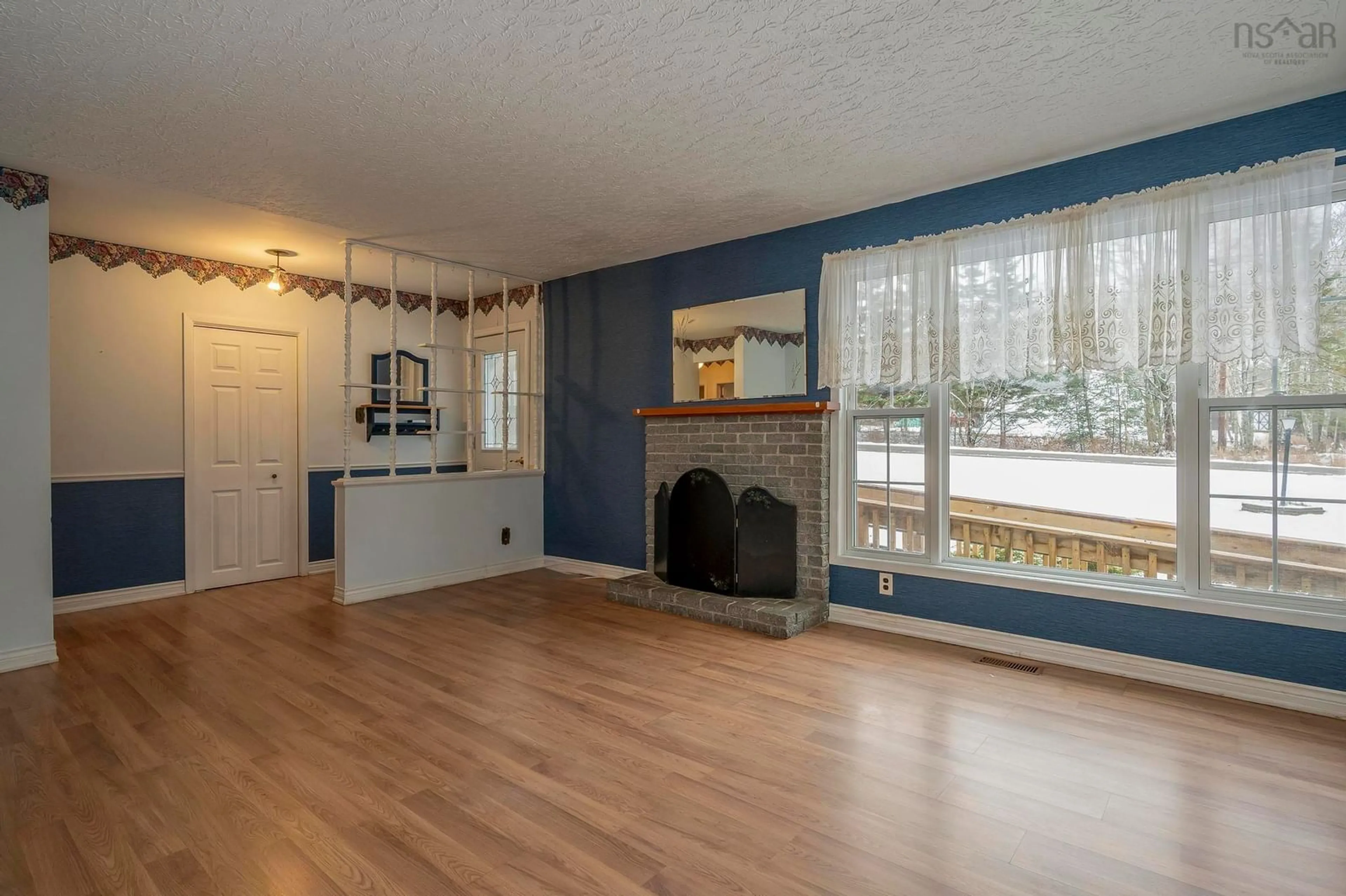 Living room with furniture, wood/laminate floor for 37 Maple St, Hilden Nova Scotia B0N 1C0