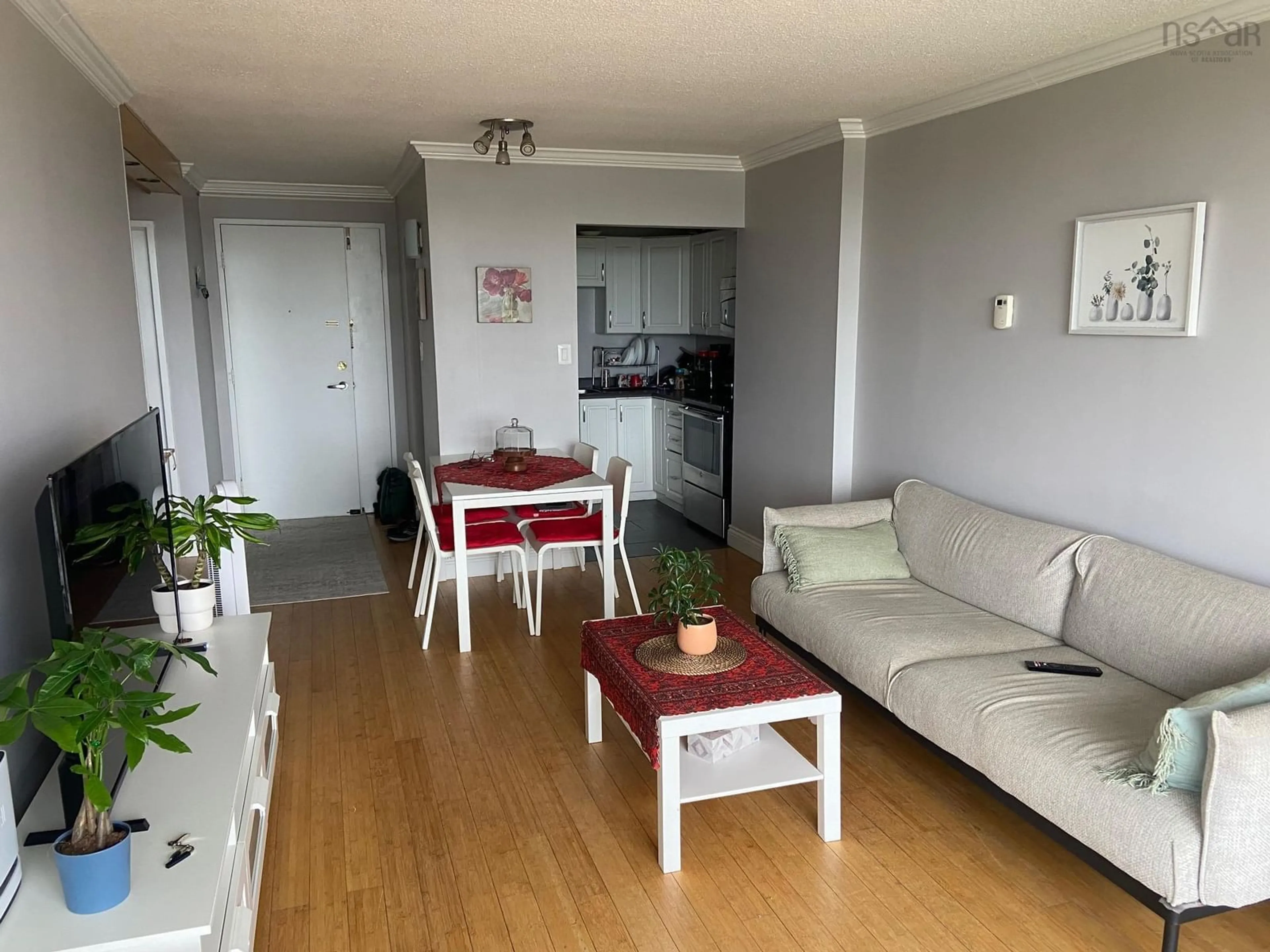 Living room with furniture, wood/laminate floor for 6369 Coburg Rd #807, Halifax Nova Scotia B3H 4J7