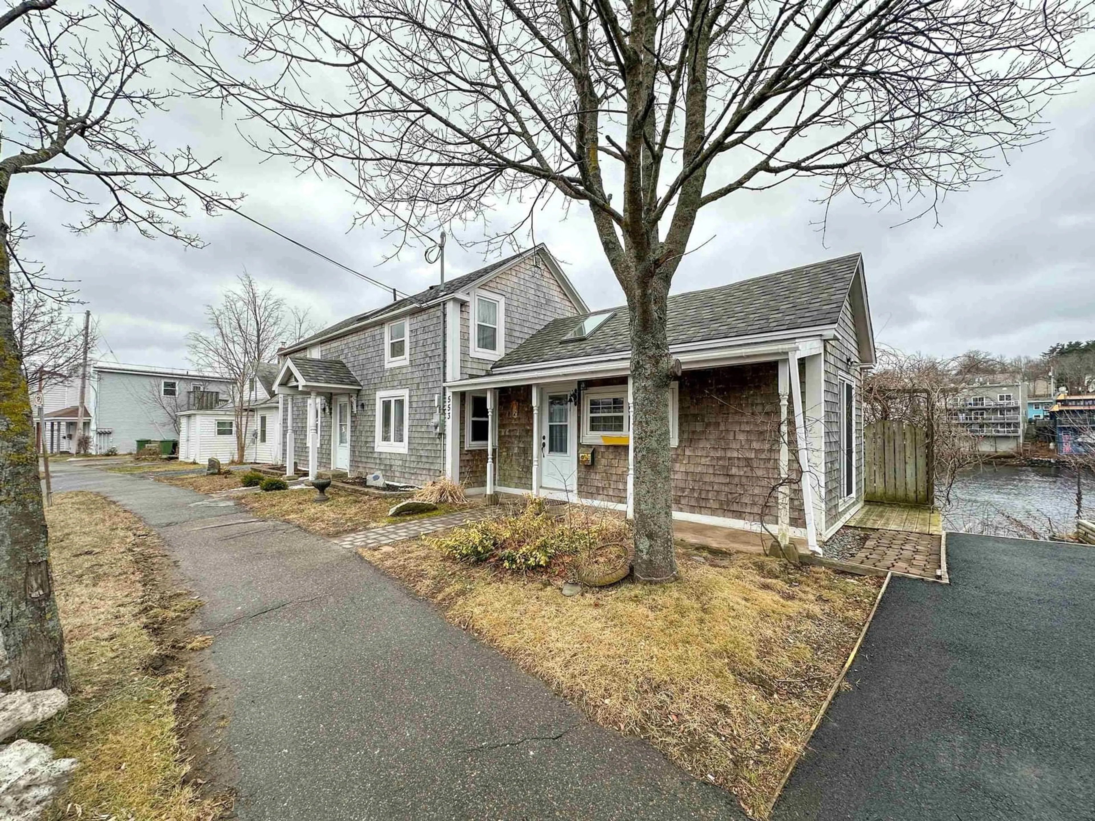 A pic from outside/outdoor area/front of a property/back of a property/a pic from drone, street for 553 Lahave St, Bridgewater Nova Scotia B4V 2V1