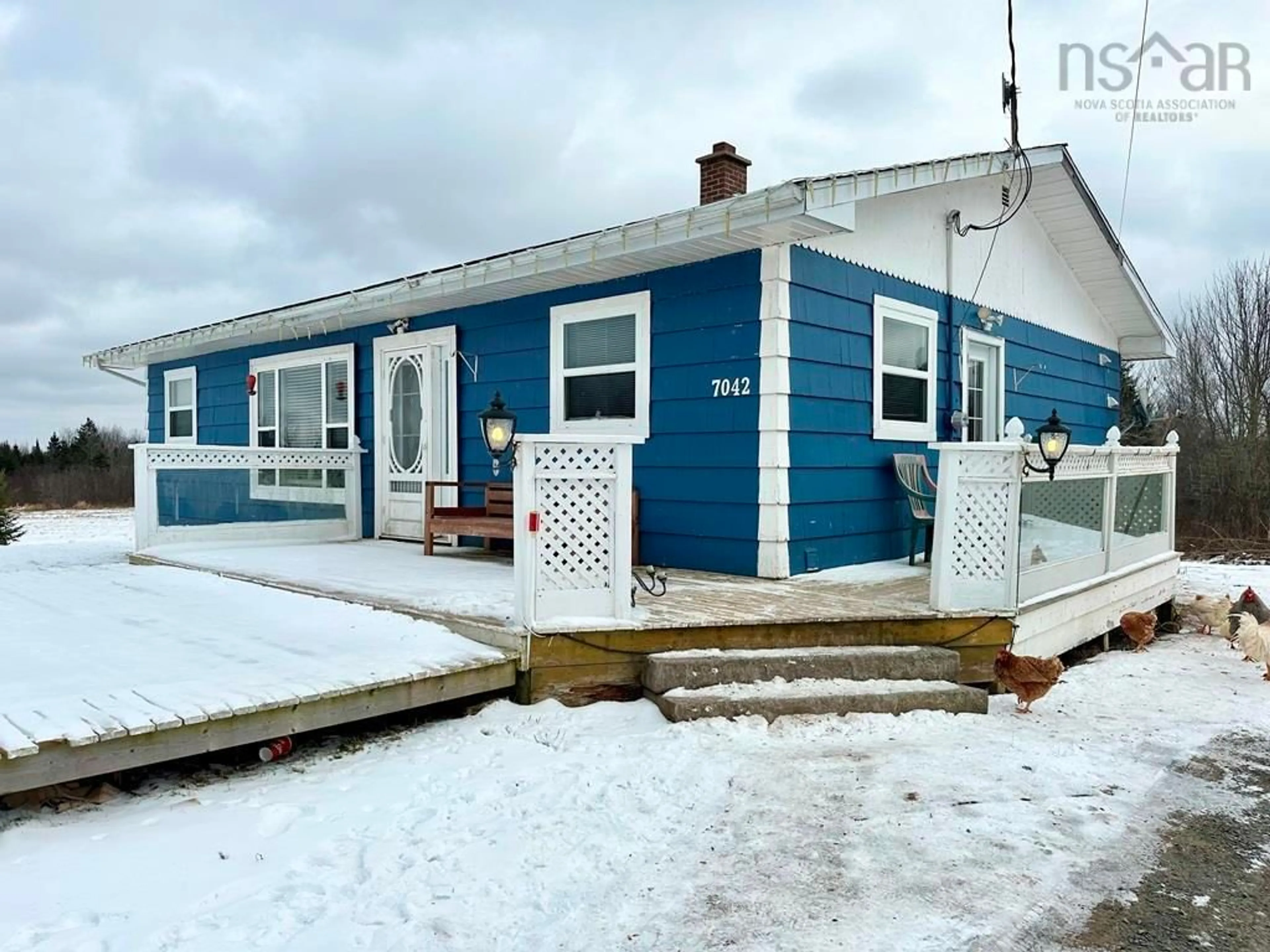 Home with vinyl exterior material, street for 7042 Highway 236, Upper Kennetcook Nova Scotia B0N 1T0