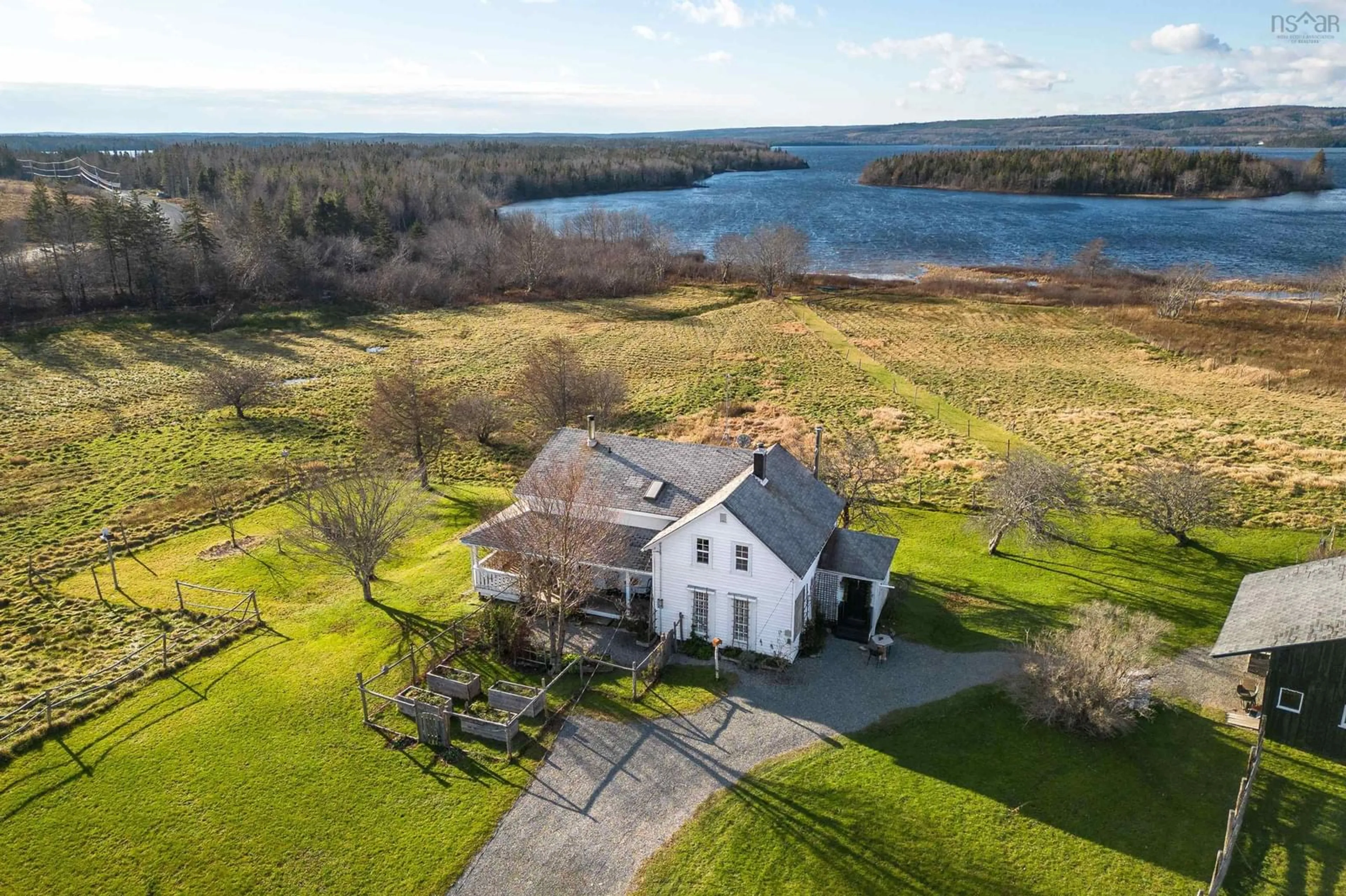 A pic from outside/outdoor area/front of a property/back of a property/a pic from drone, water/lake/river/ocean view for 2660 Loch Lomond Rd, Enon Nova Scotia B1J 1W8