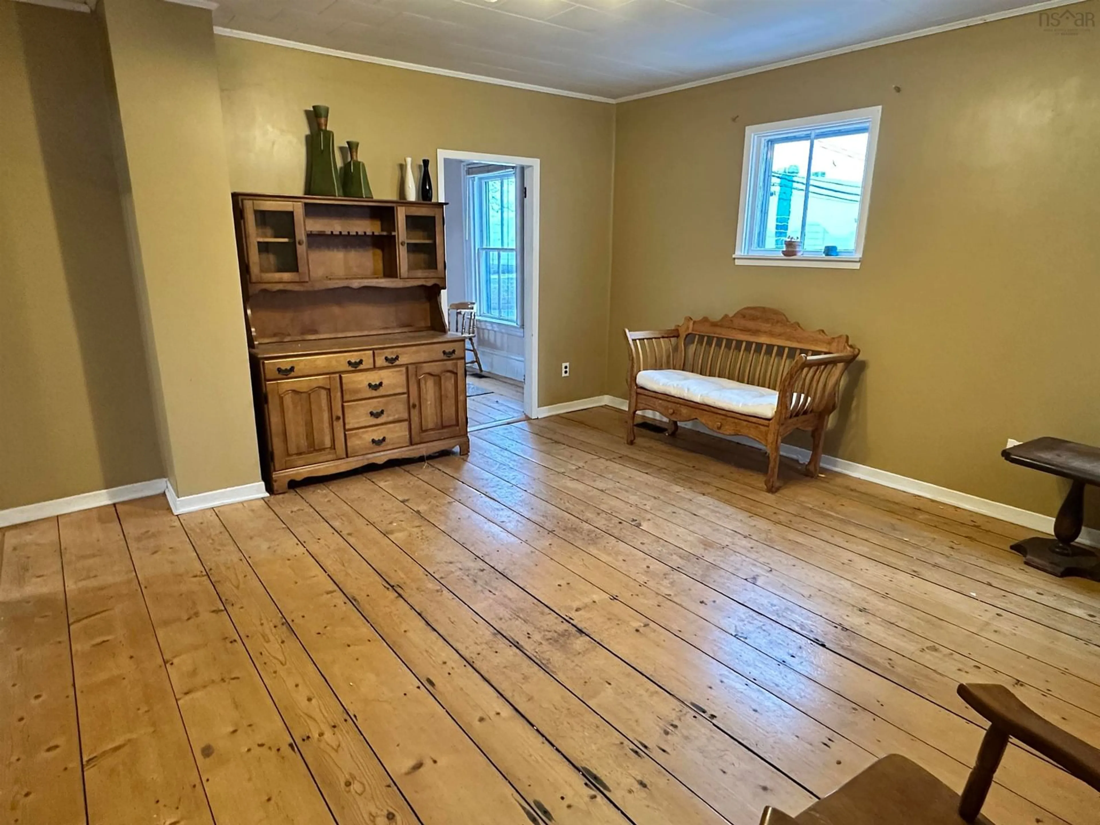 Living room with furniture, wood/laminate floor for 41 Bristol Ave, Liverpool Nova Scotia B0T 1K0