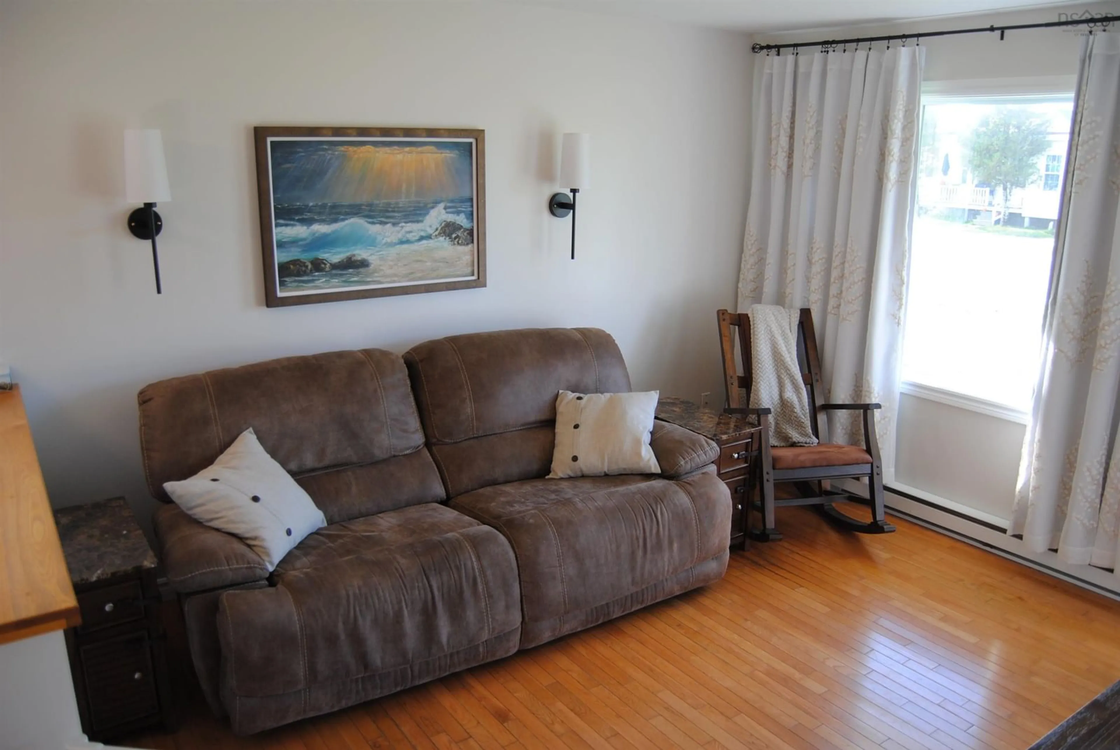 Living room with furniture, wood/laminate floor for 219 Brookside St, Glace Bay Nova Scotia B1A 1L7