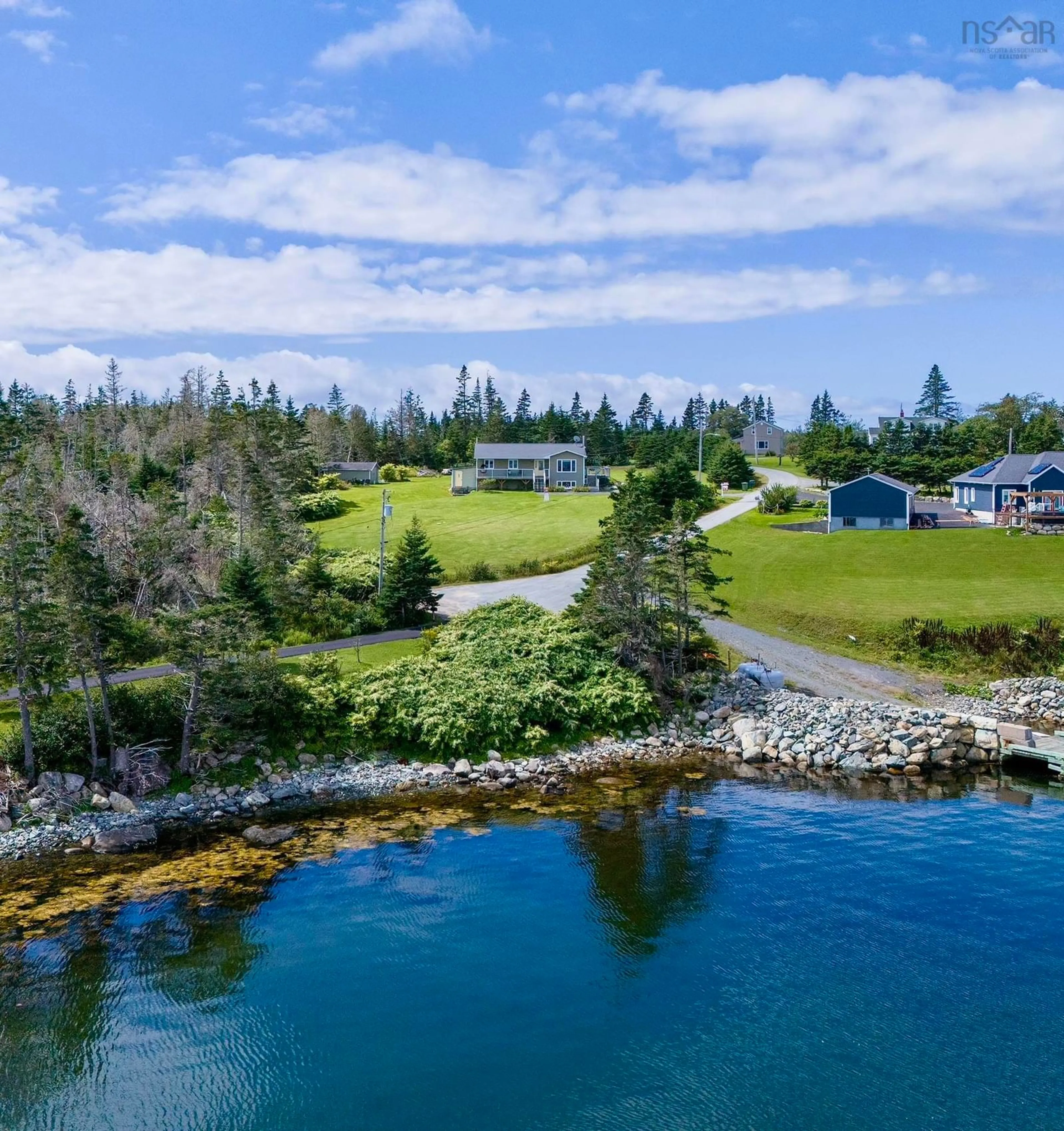 A pic from outside/outdoor area/front of a property/back of a property/a pic from drone, water/lake/river/ocean view for 38 Hutt Rd, Owls Head Nova Scotia B0J 2L0