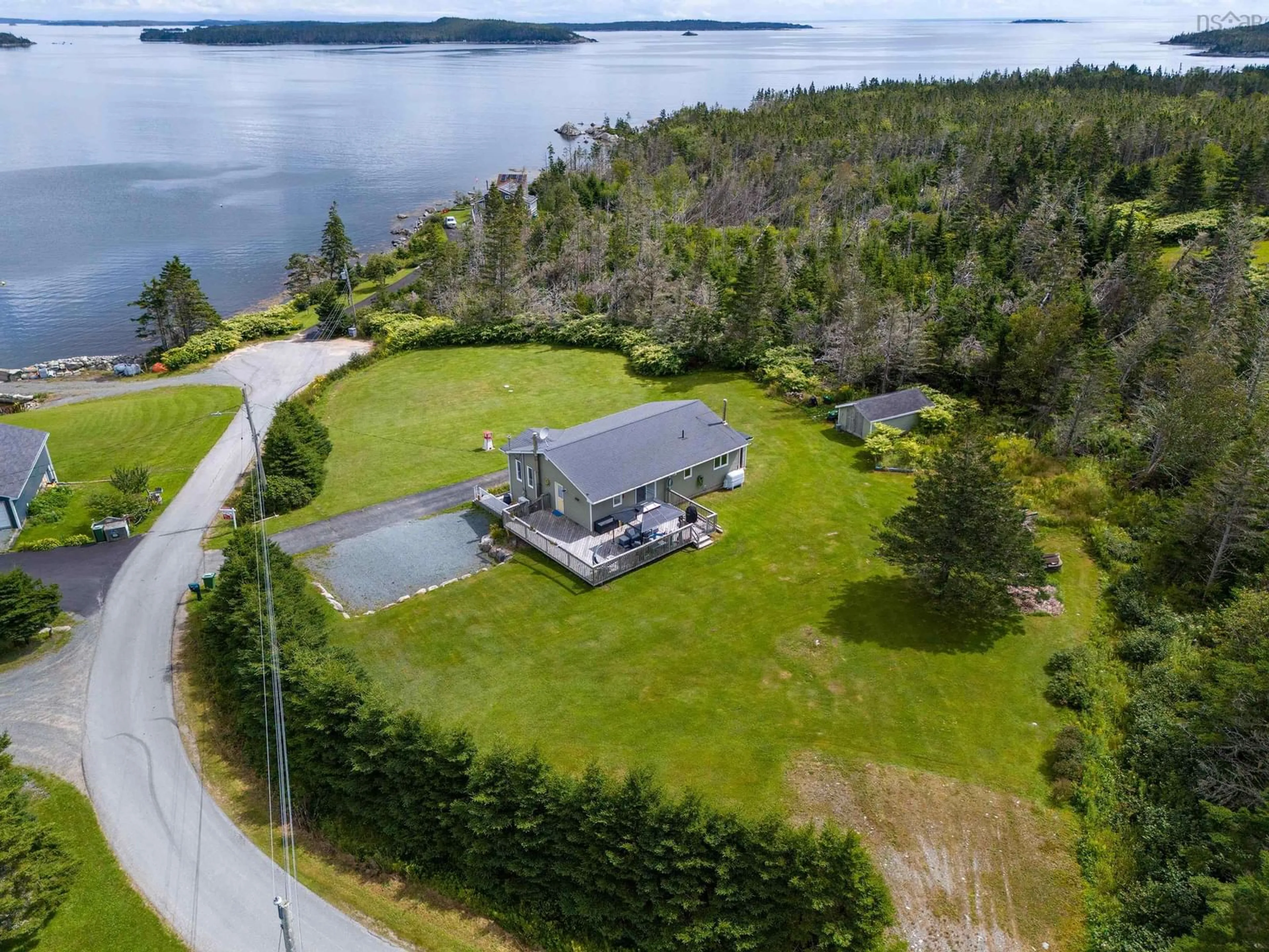 A pic from outside/outdoor area/front of a property/back of a property/a pic from drone, water/lake/river/ocean view for 38 Hutt Rd, Owls Head Nova Scotia B0J 2L0