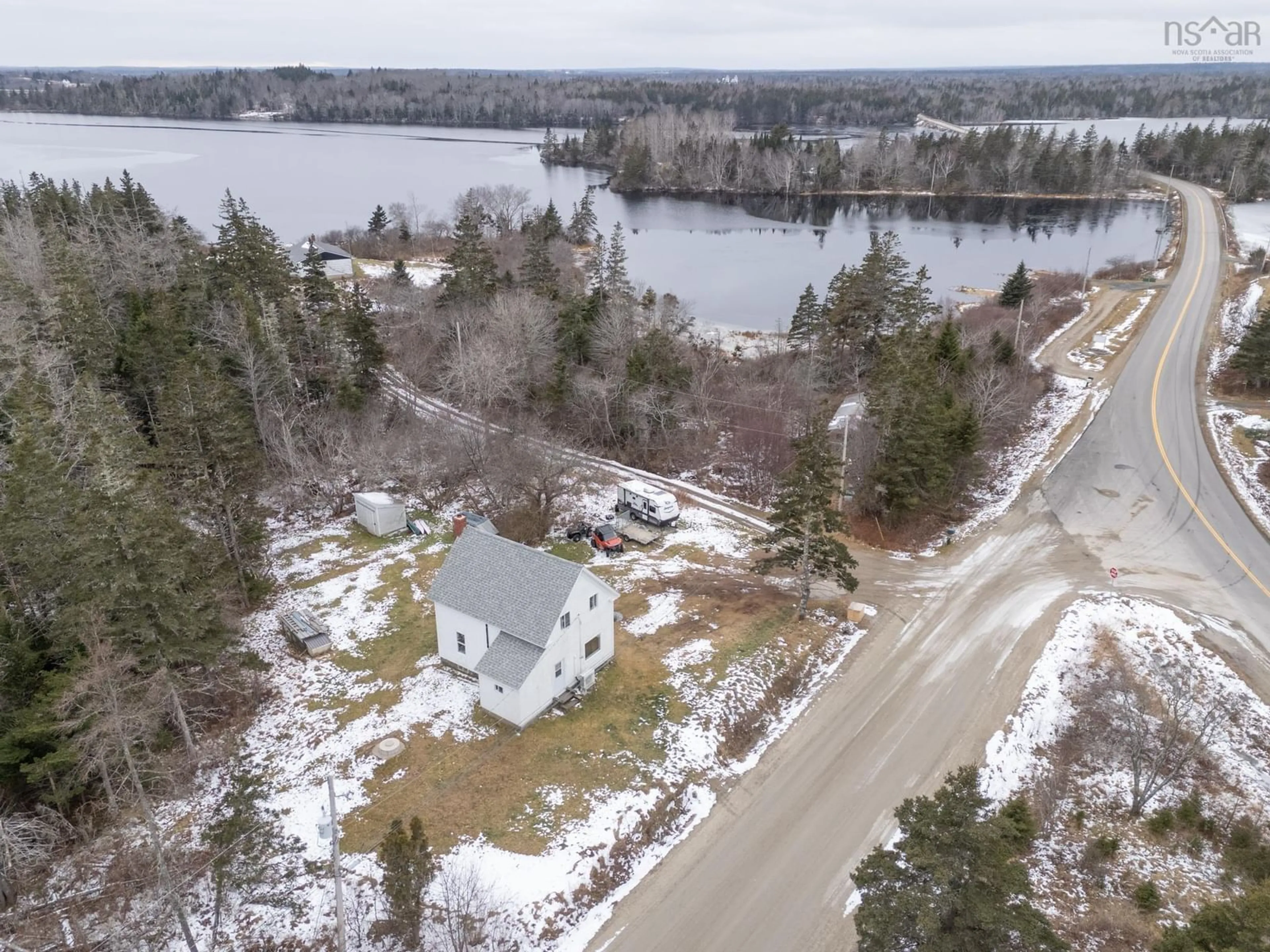 A pic from outside/outdoor area/front of a property/back of a property/a pic from drone, water/lake/river/ocean view for 16 Belleville South Rd, Belleville South Nova Scotia B0W 3M0