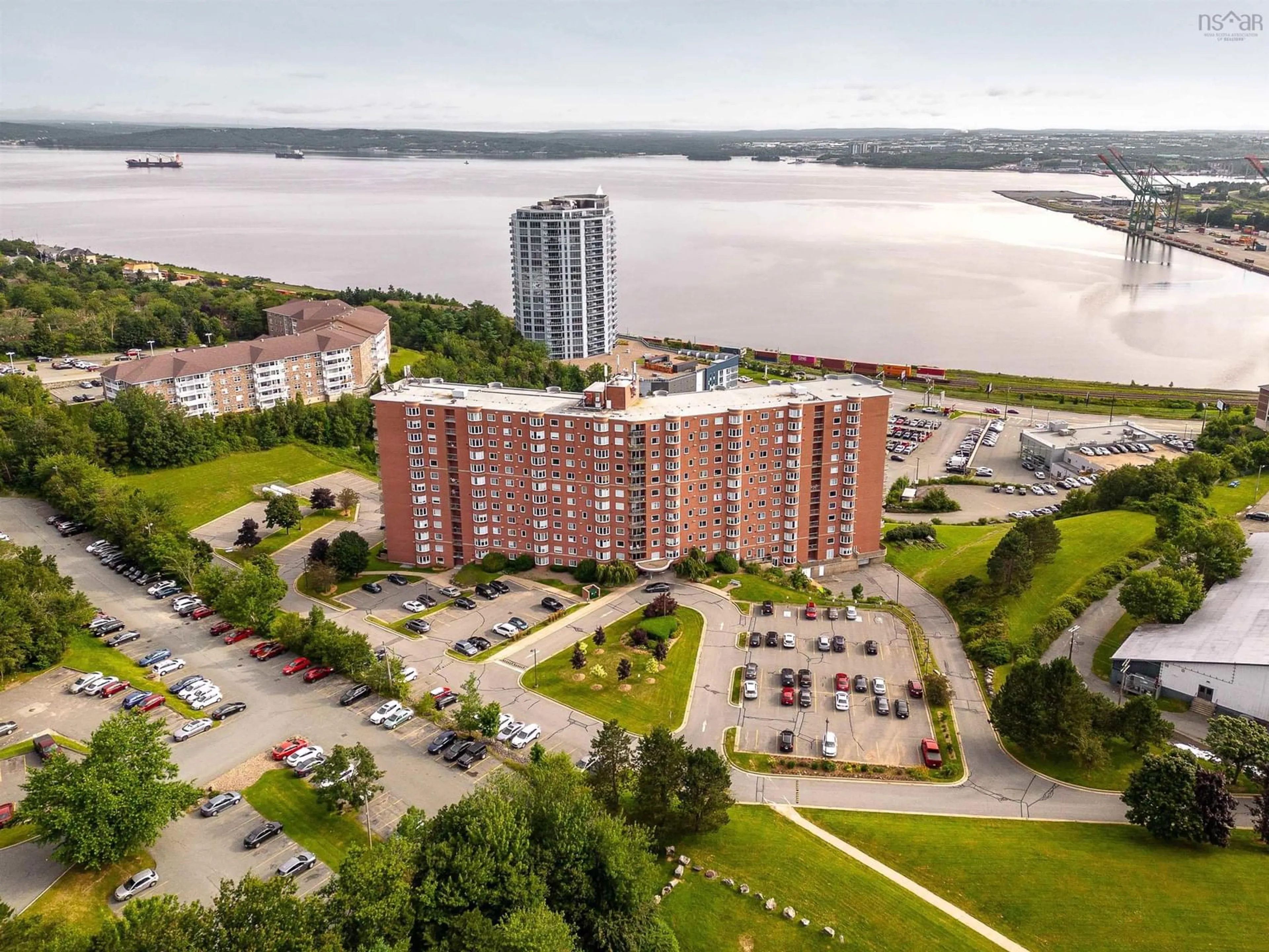 A pic from outside/outdoor area/front of a property/back of a property/a pic from drone, water/lake/river/ocean view for 45 Vimy Ave #613, Halifax Nova Scotia B3M 4C5