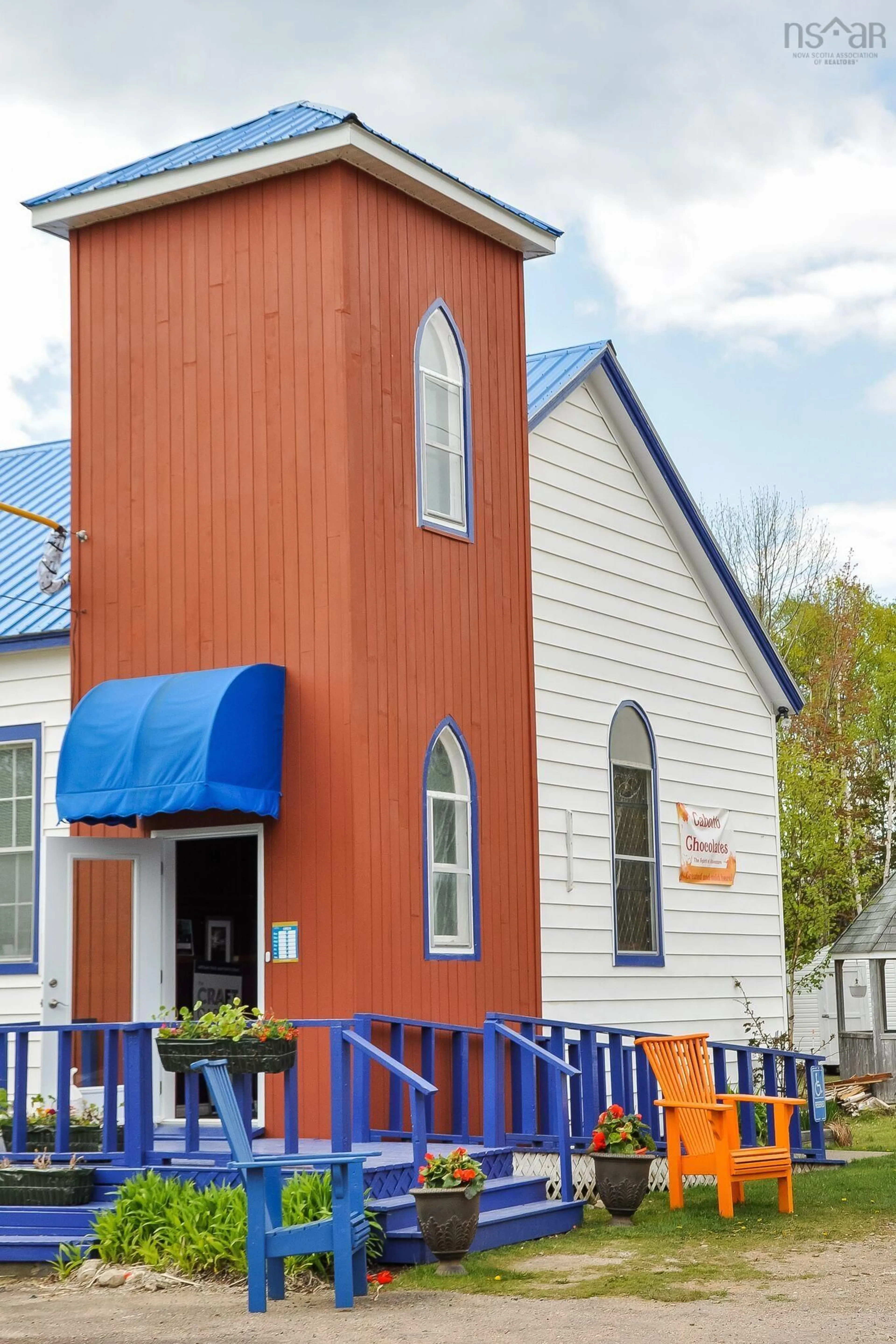 Home with vinyl exterior material, building for 45943 Cabot Trail, Indian Brook Nova Scotia B0C 1H0