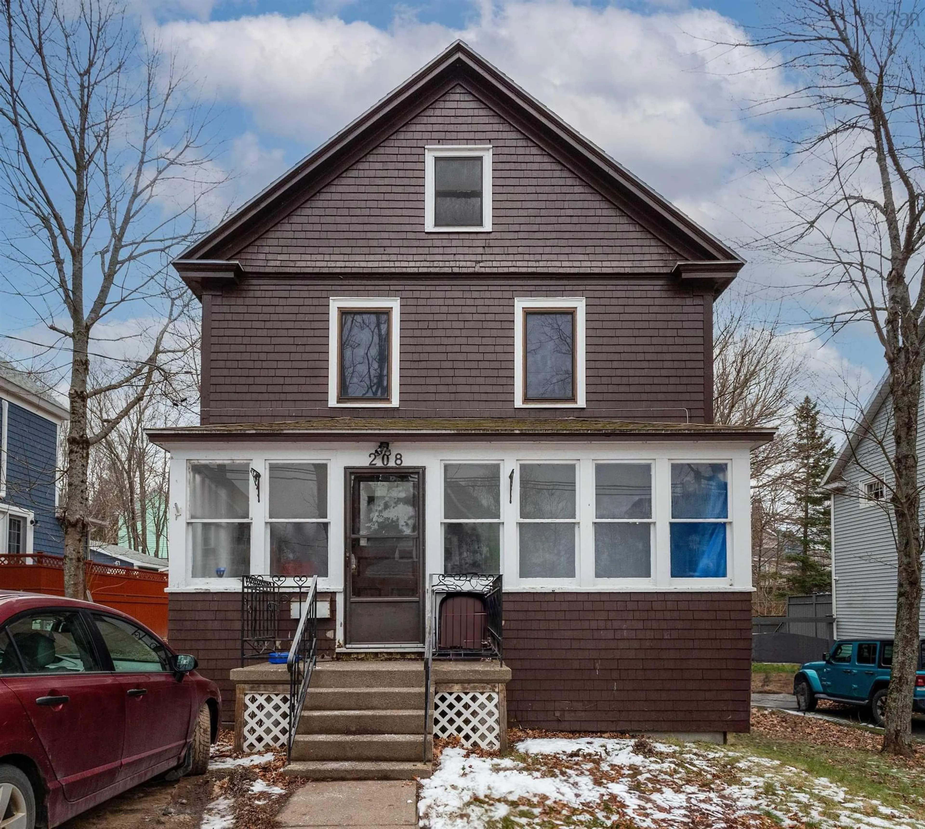 Home with vinyl exterior material, street for 208 Whitney Ave, Sydney Nova Scotia B1P 5A4