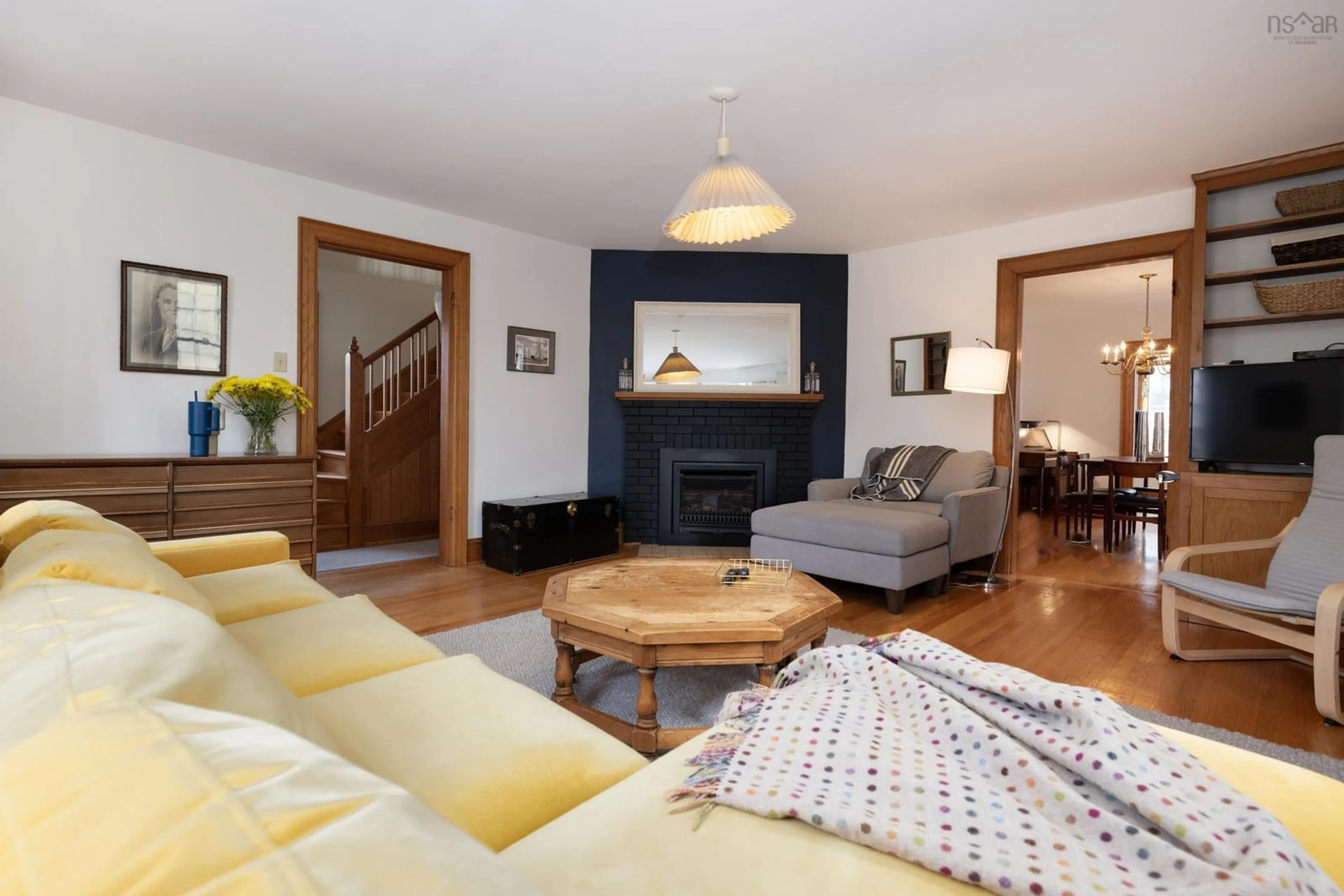 Living room with furniture, wood/laminate floor for 1623 Cambridge St, Halifax Nova Scotia B3H 4A5